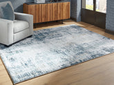3 Brothers Decor - Ashley Furniture - Arlenmont Rug - 7'6" X 9'6" Memory Foam Area Rug - R407481