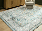 3 Brothers Decor - Ashley Furniture - Ladstoney Rug - 7'6" X 9'6" Memory Foam Area Rug - R407501