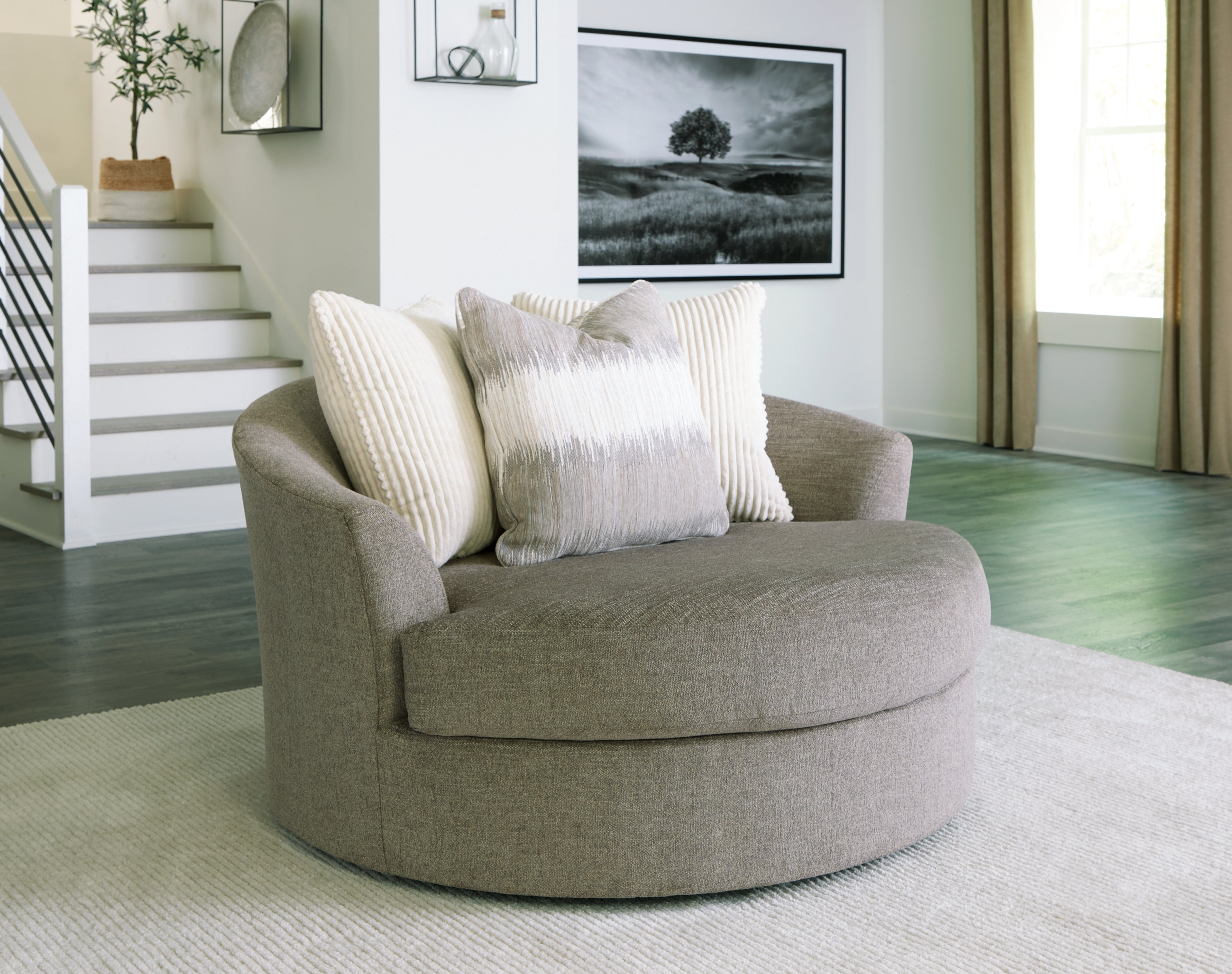 3 Brothers Decor - Ashley Furniture - Creswell Living Room - Oversized Swivel Accent Chair / Stone - 1530521