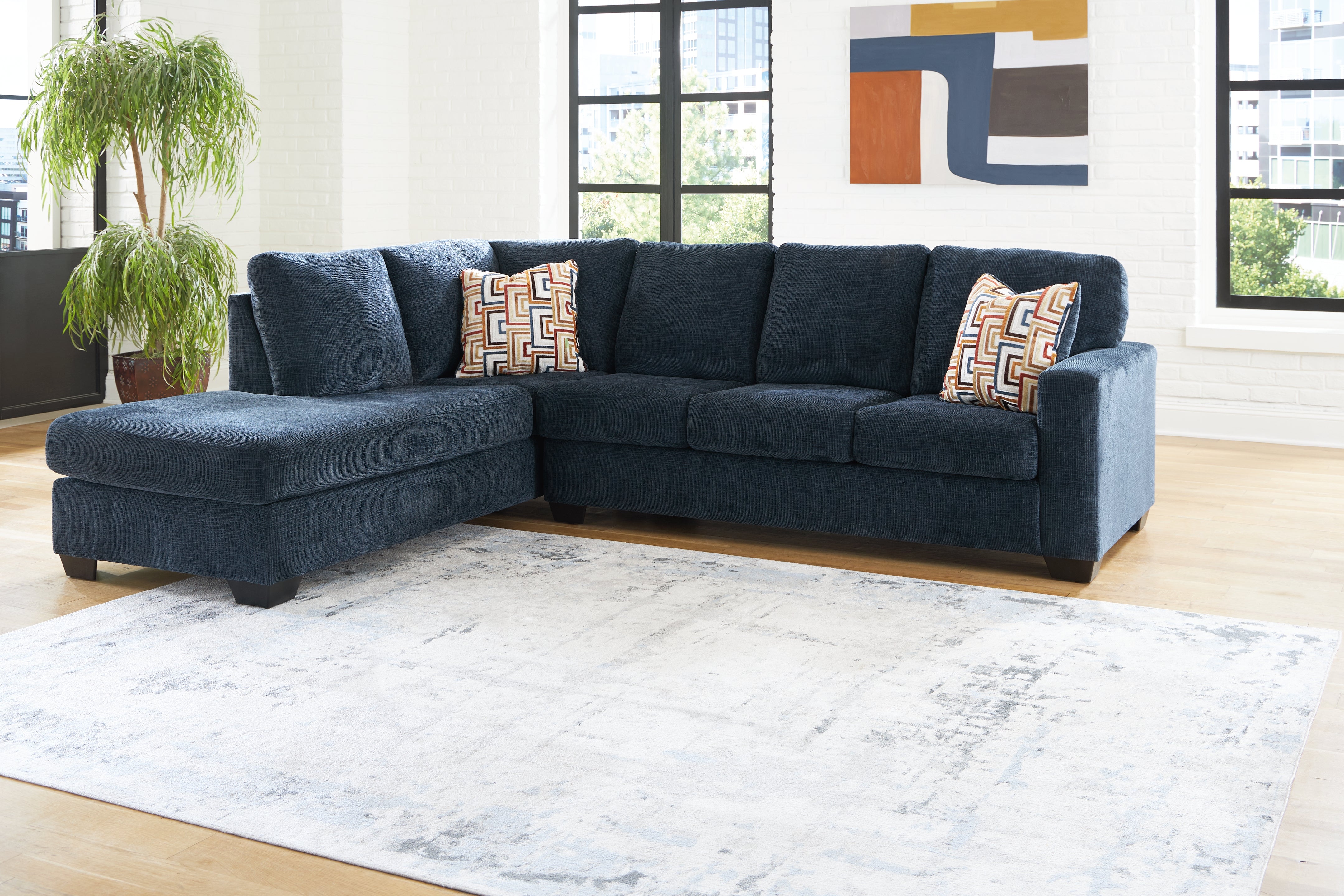3 Brothers Decor - Ashley Furniture - Aviemore Sectional - RAF 2-Piece Sectional with Chaise / Ink - 24303S1