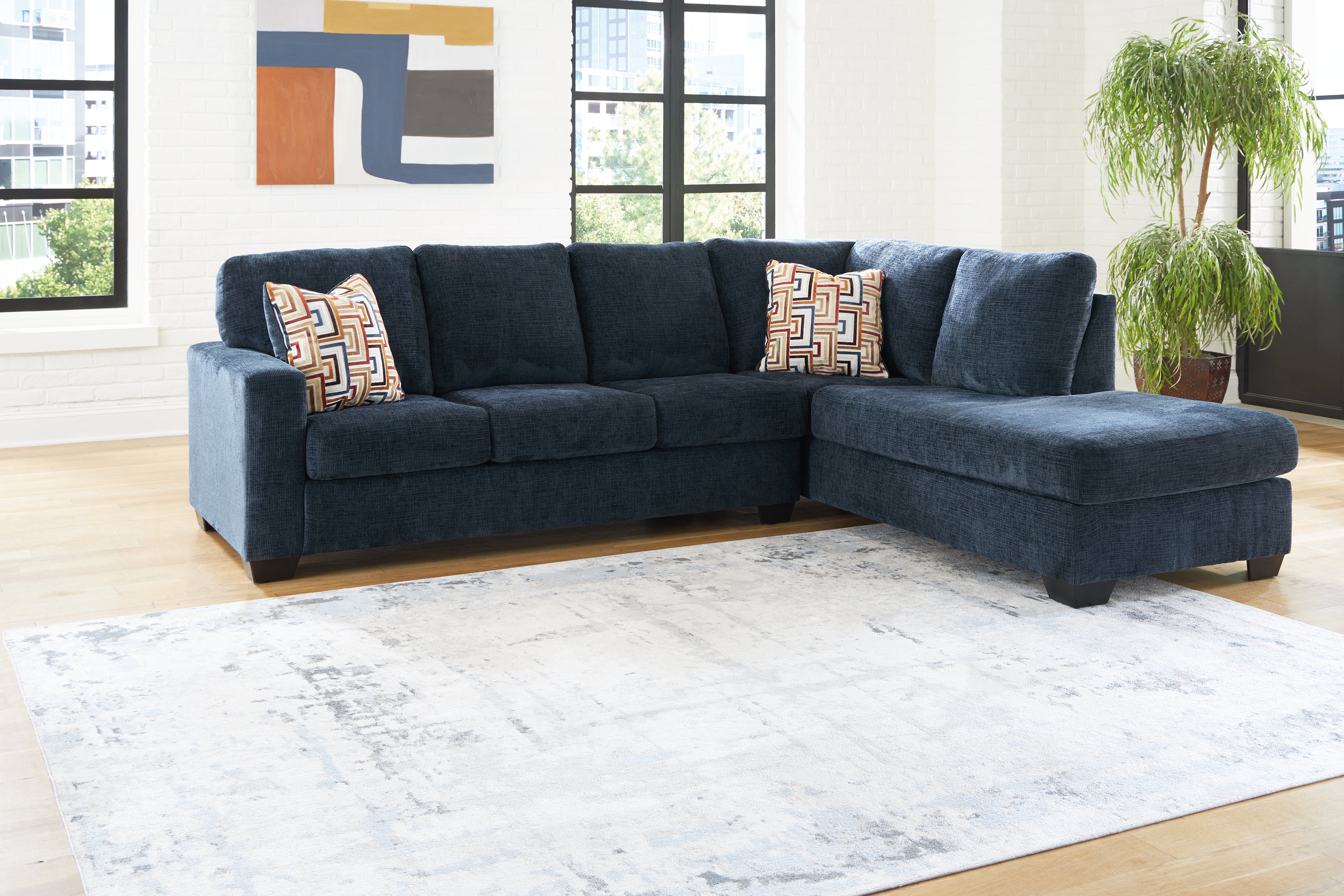 3 Brothers Decor - Ashley Furniture - Aviemore Sectional - LAF 2-Piece Sectional with Chaise / Ink - 24303S2