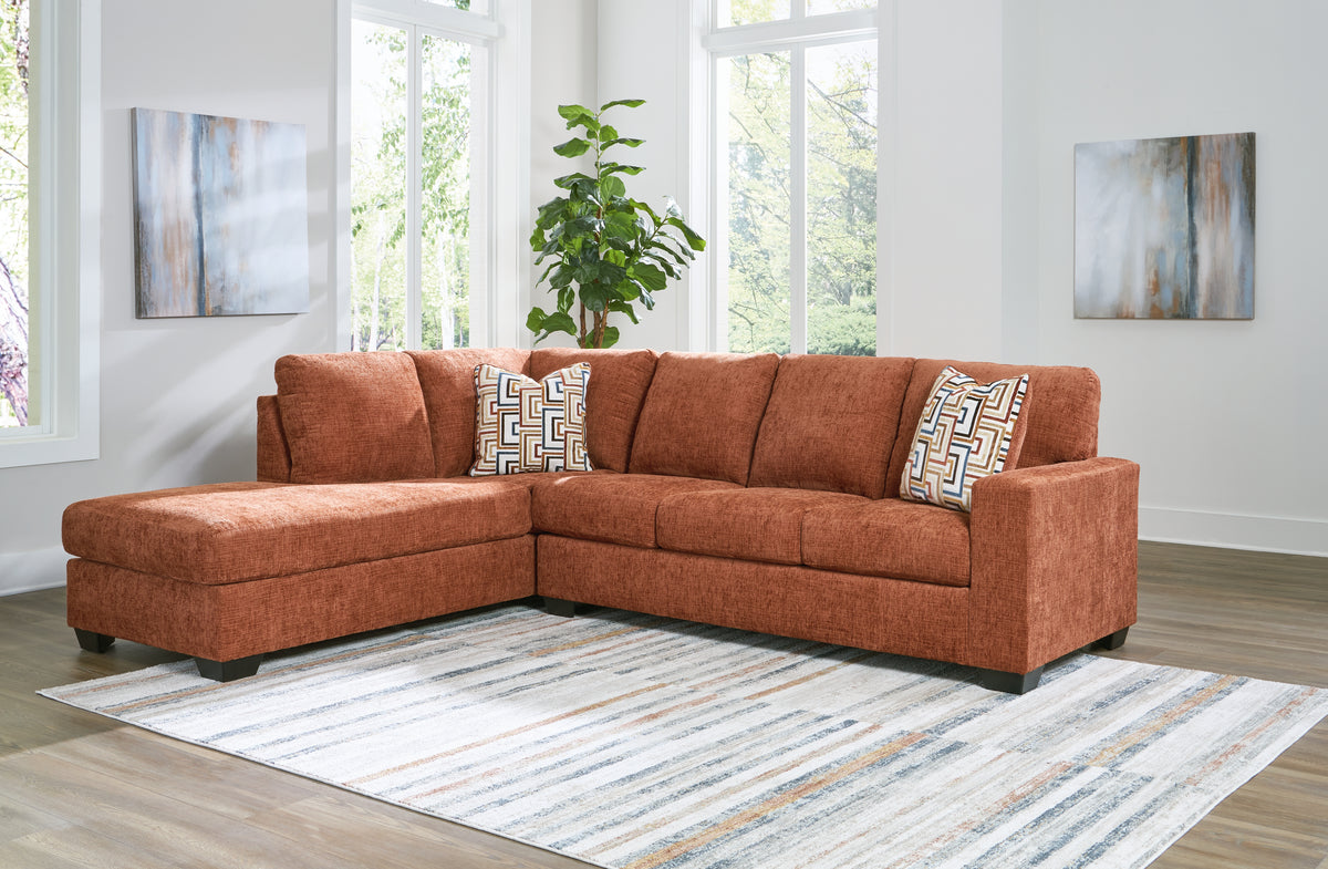 3 Brothers Decor - Ashley Furniture - Aviemore Sectional - RAF 2-Piece Sectional with Chaise / Spice - 24304S1
