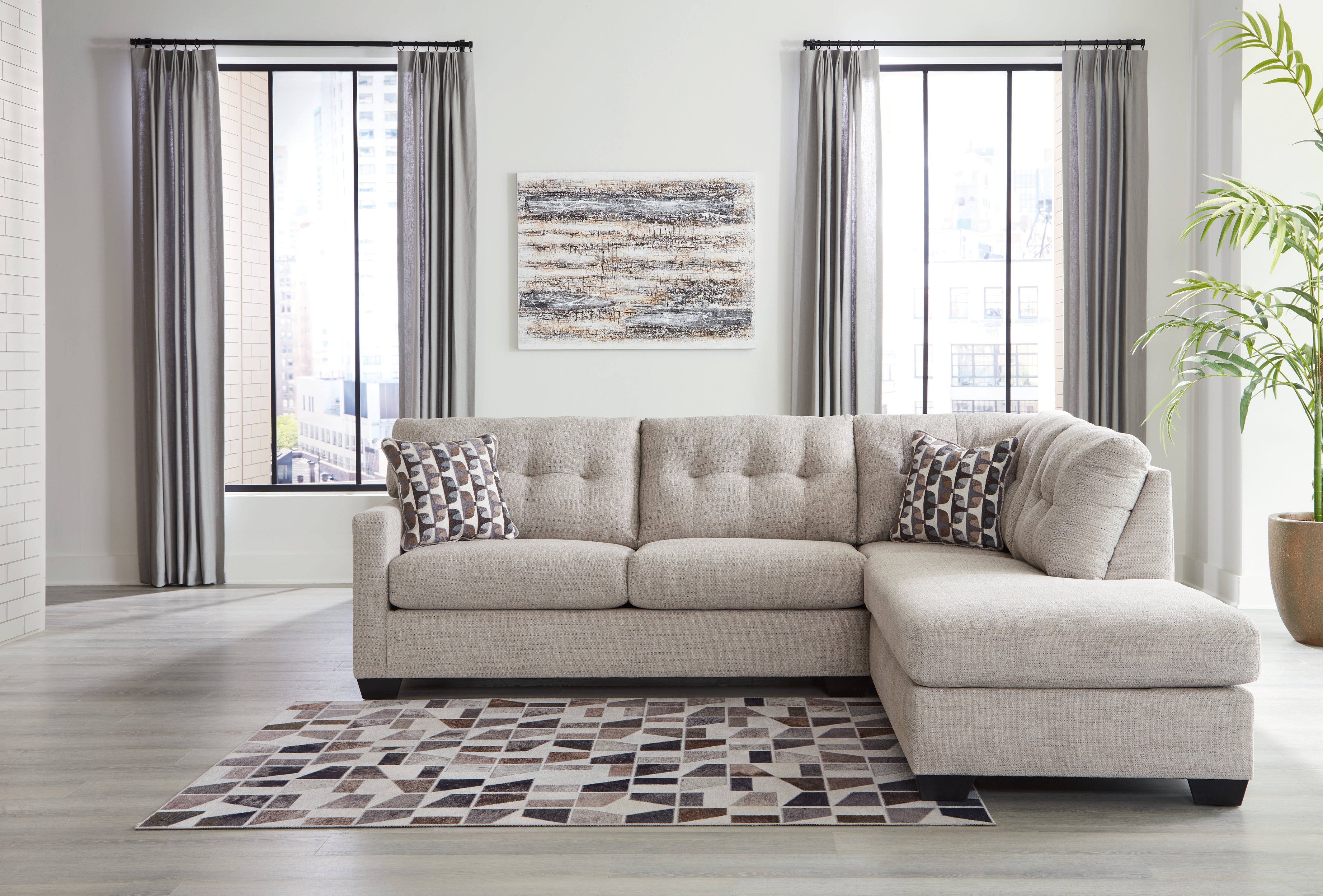 3 Brothers Decor - Ashley Furniture - Mahoney Sectional - LAF 2-Piece Sectional with Chaise / Pebble - 31004S2