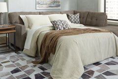 3 Brothers Decor - Ashley Furniture - Mahoney Sectional - 2-Piece Sleeper Sectional with Chaise / Chocolate - 31005S4