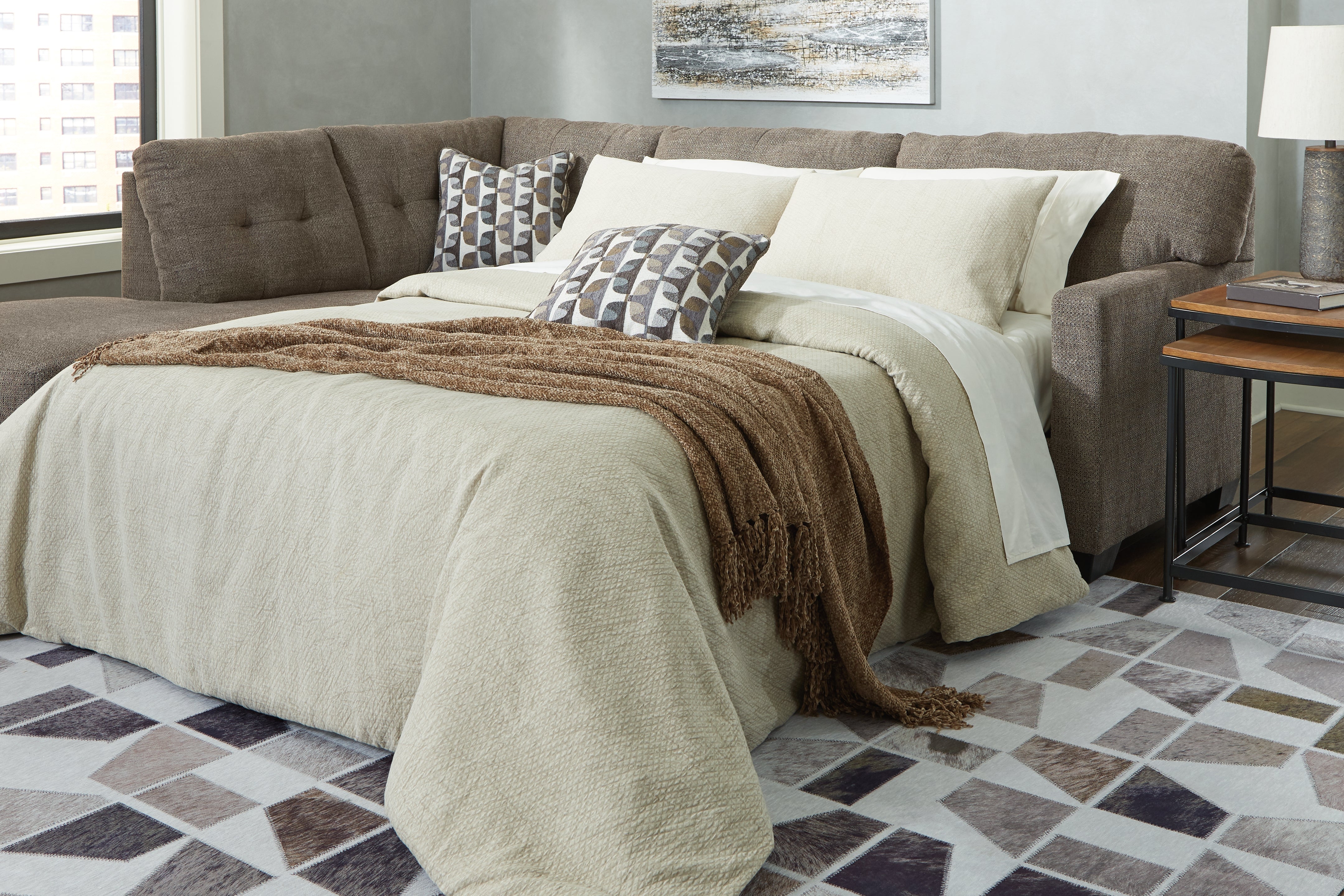 3 Brothers Decor - Ashley Furniture - Mahoney Sectional - RAF 2-Piece Sleeper Sectional with Chaise / Chocolate - 31005S3
