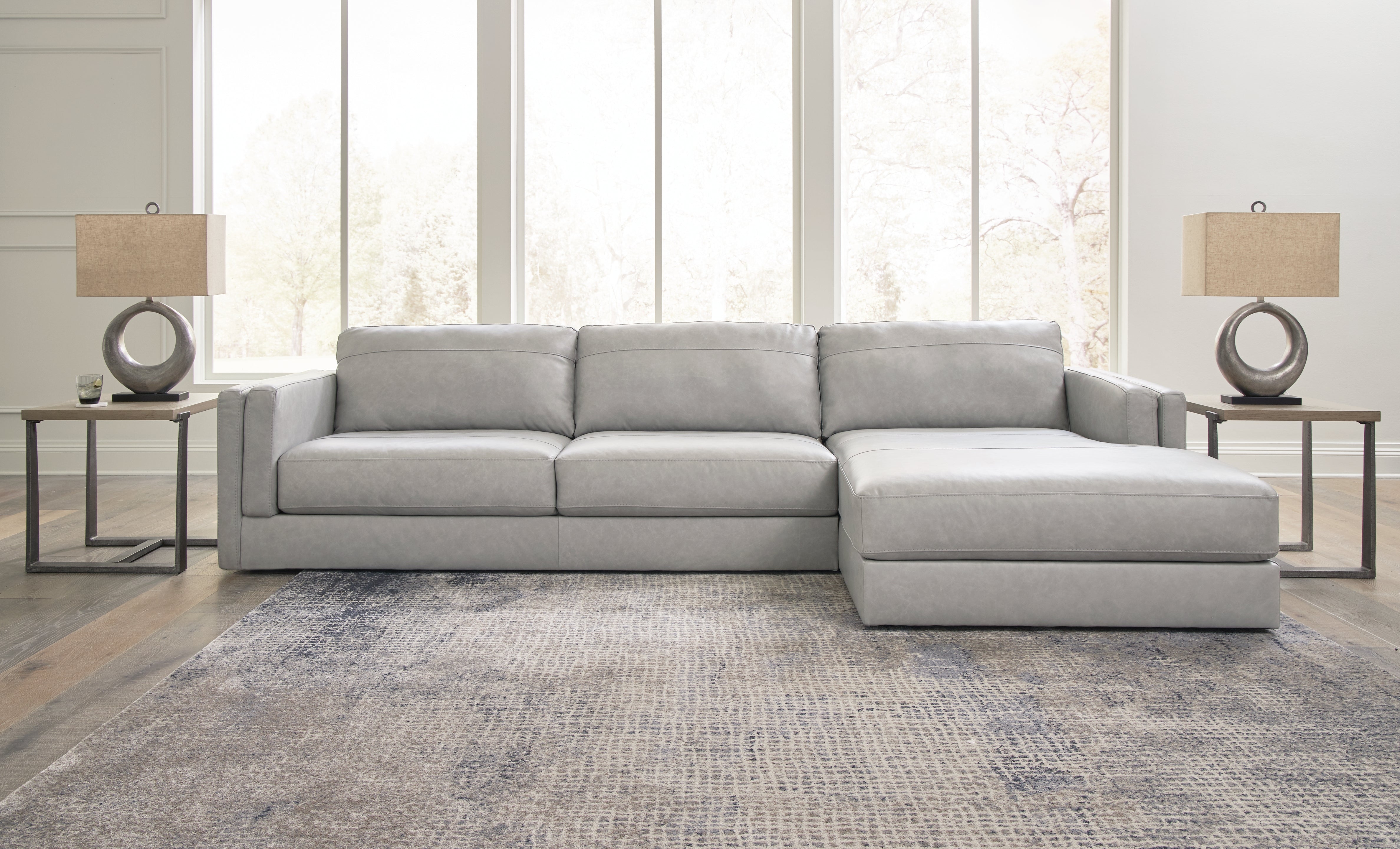 3 Brothers Decor - Ashley Furniture - Amiata Sectional - LAF 2-Piece Sectional with Chaise / Glacier - 57404S2