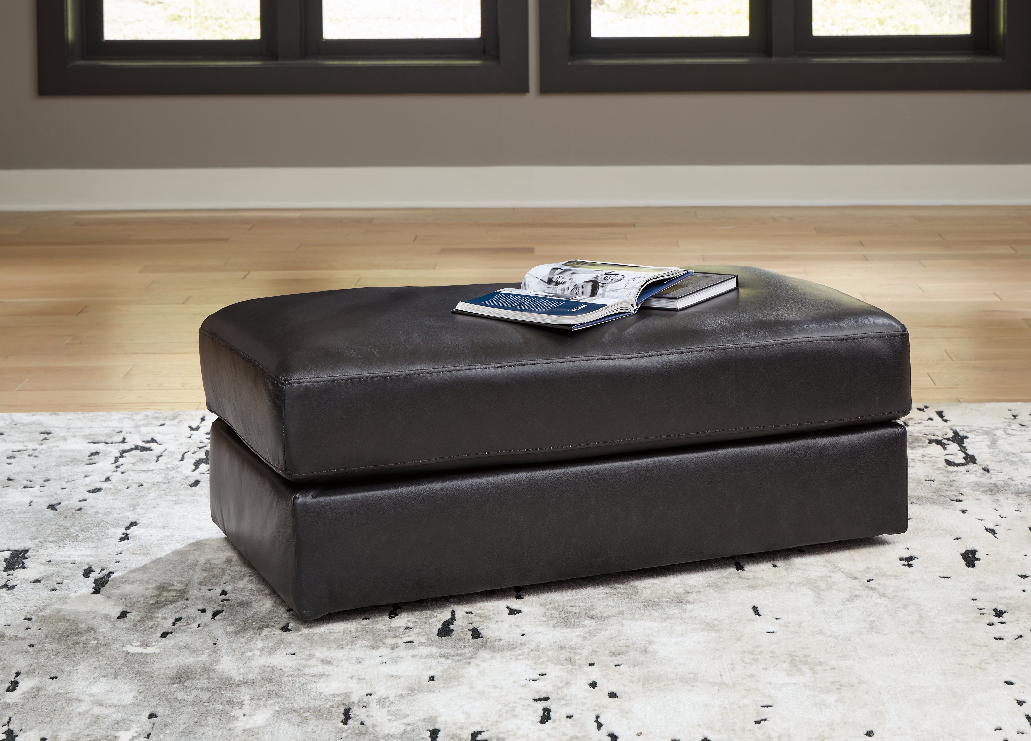 3 Brothers Decor - Ashley Furniture - Amiata Living Room - Ottoman / Onyx - 5740514