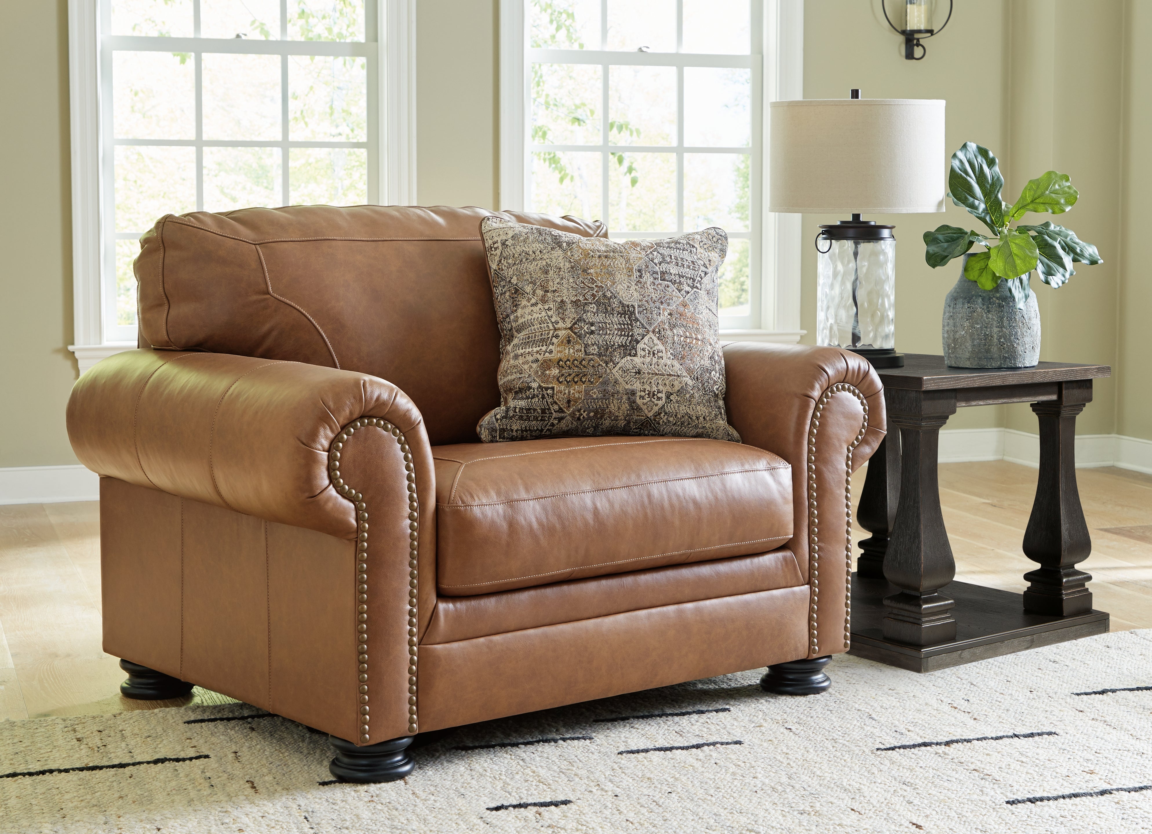 3 Brothers Decor - Ashley Furniture - Carianna Living Room - Chair and a Half / Caramel - 5760423