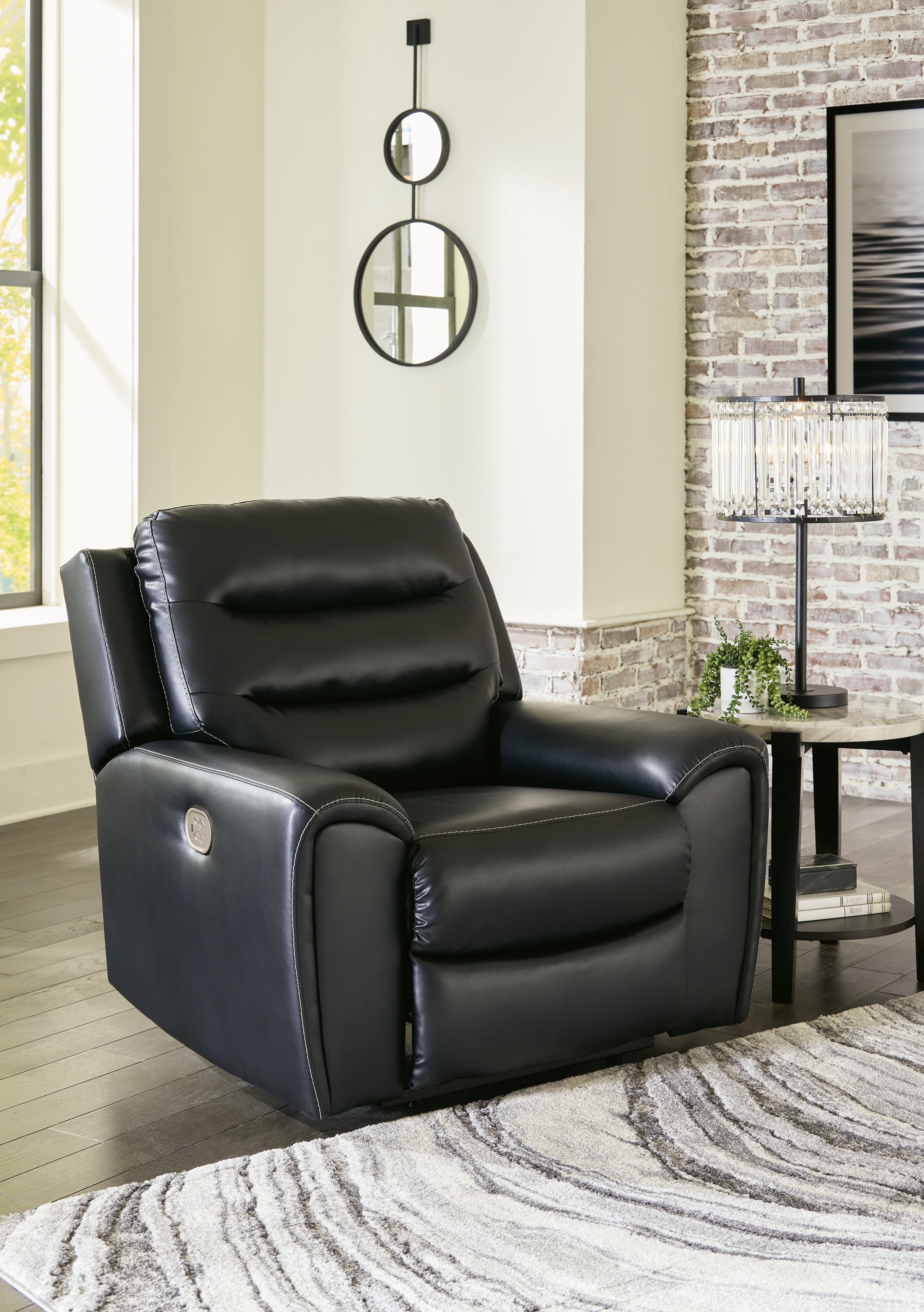 3 Brothers Decor - Ashley Furniture - Warlin Living Room - PWR Recliner/ADJ Headrest / Black - 6110513