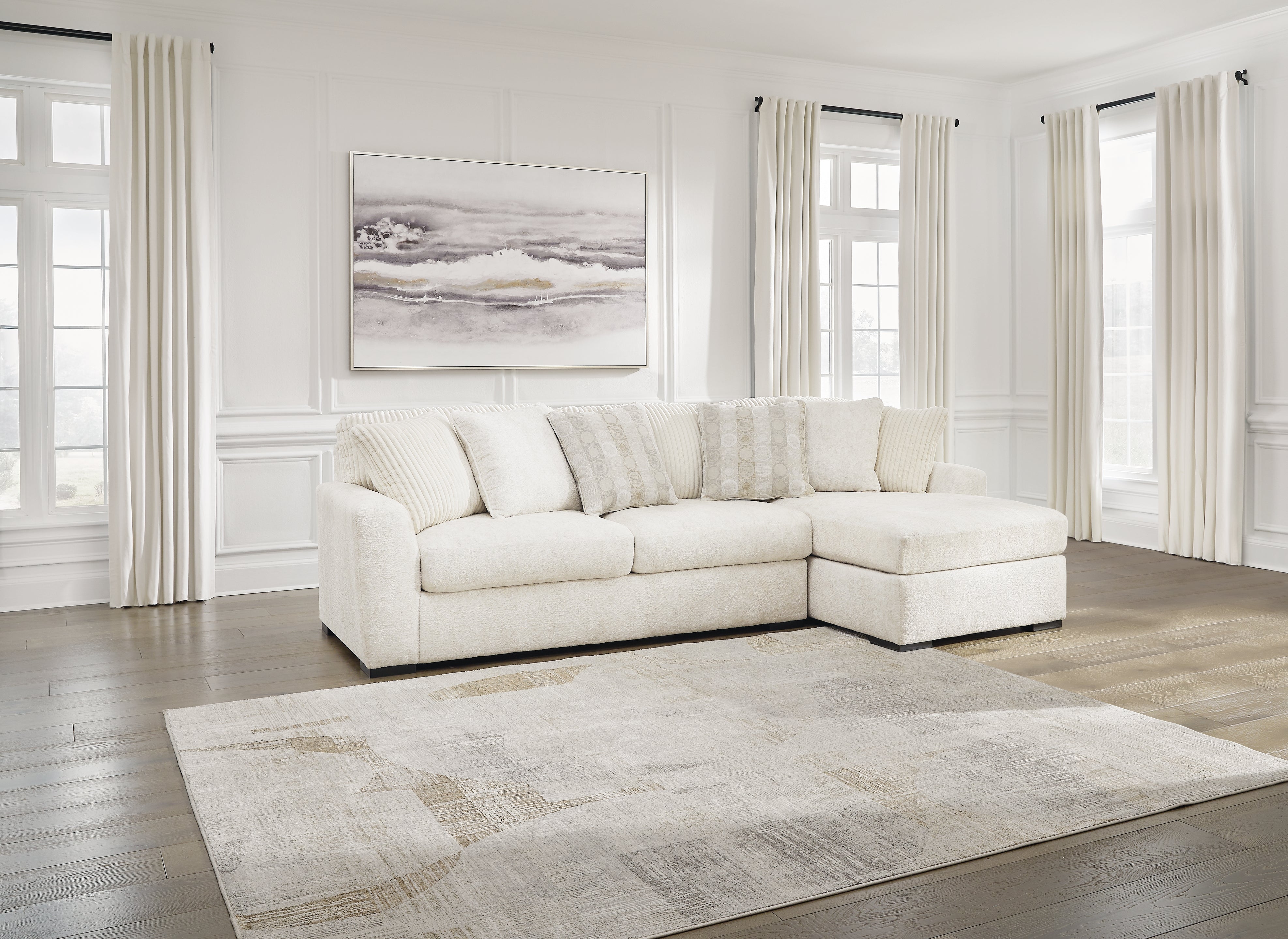 3 Brothers Decor - Ashley Furniture - Chessington Sectional - LAF 2-Piece Sectional with Chaise / Ivory - 61904S2
