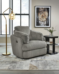 3 Brothers Decor - Ashley Furniture - Tie-Breaker Living Room - Swivel Glider Recliner / Fog - 9490361