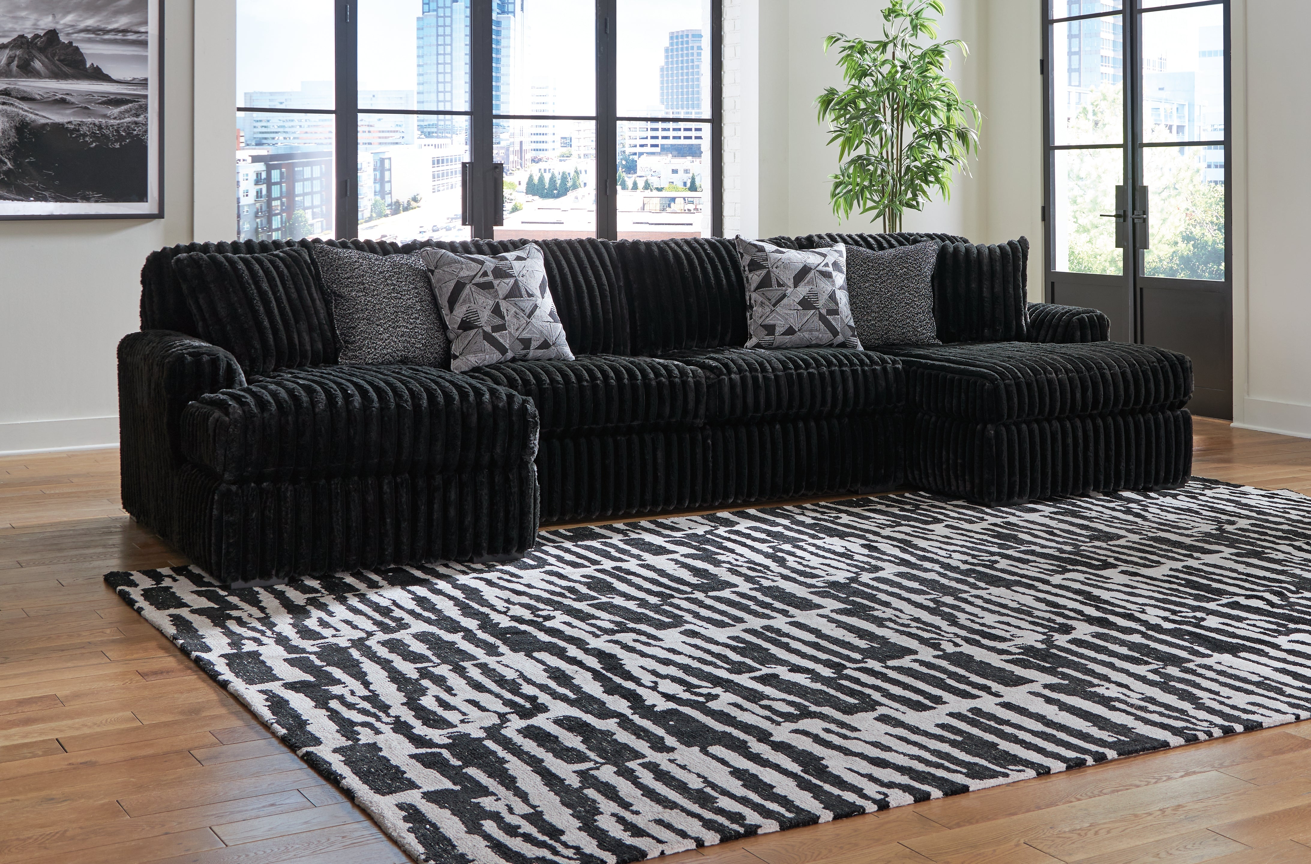 3 Brothers Decor - Ashley Furniture - Midnight-Madness Sectional - RAF 3-Piece Sectional with Chaise / Onyx - 98103S5