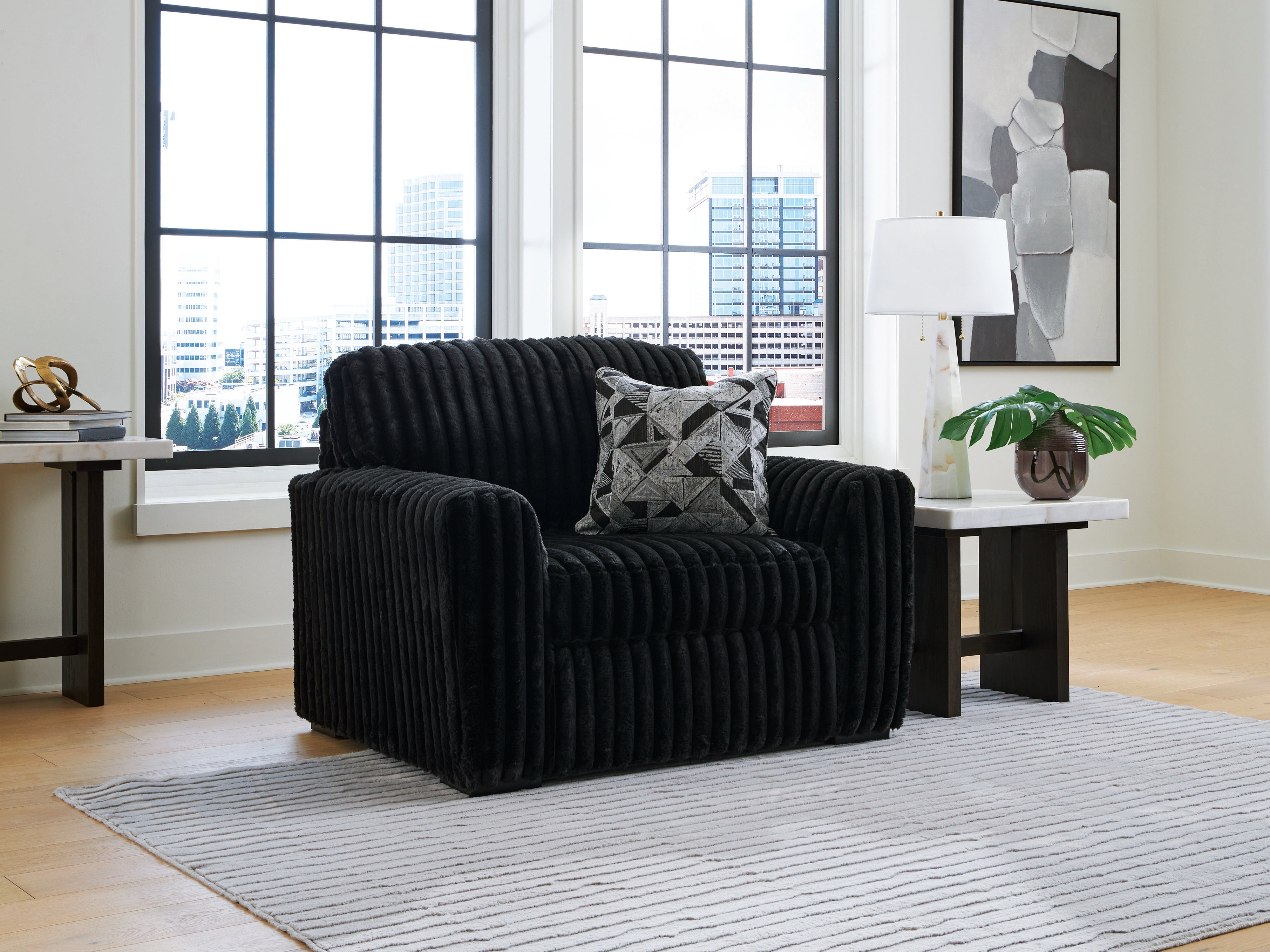 3 Brothers Decor - Ashley Furniture - Midnight-Madness Living Room - Chair and a Half / Onyx - 9810323