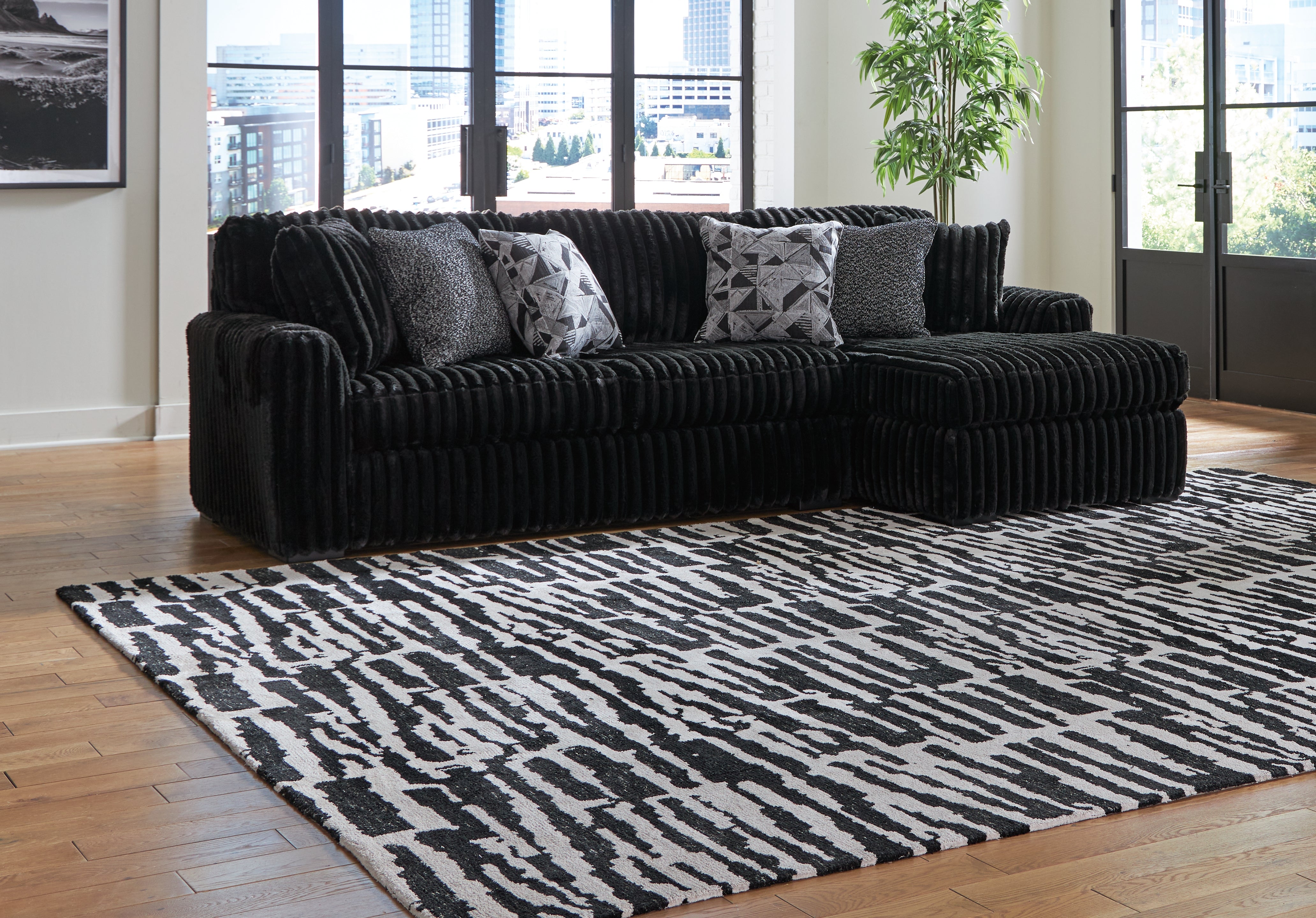 3 Brothers Decor - Ashley Furniture - Midnight-Madness Sectional - LAF 2-Piece Sectional Sofa with Chaise / Onyx - 98103S2