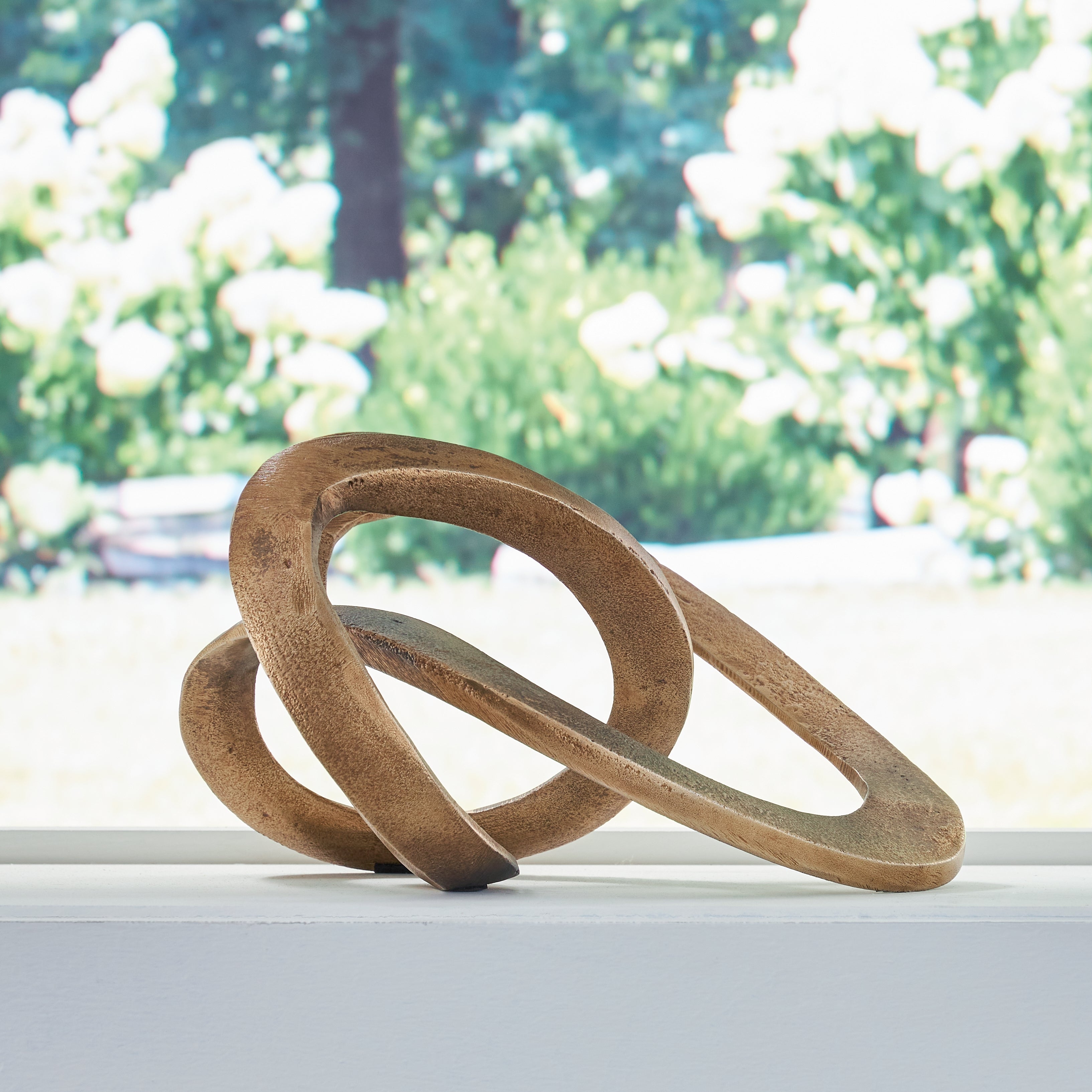 3 Brothers Decor - Ashley Furniture - Dunnruck Sculpture - Sculpture / Antique Brass Finish - A2000686