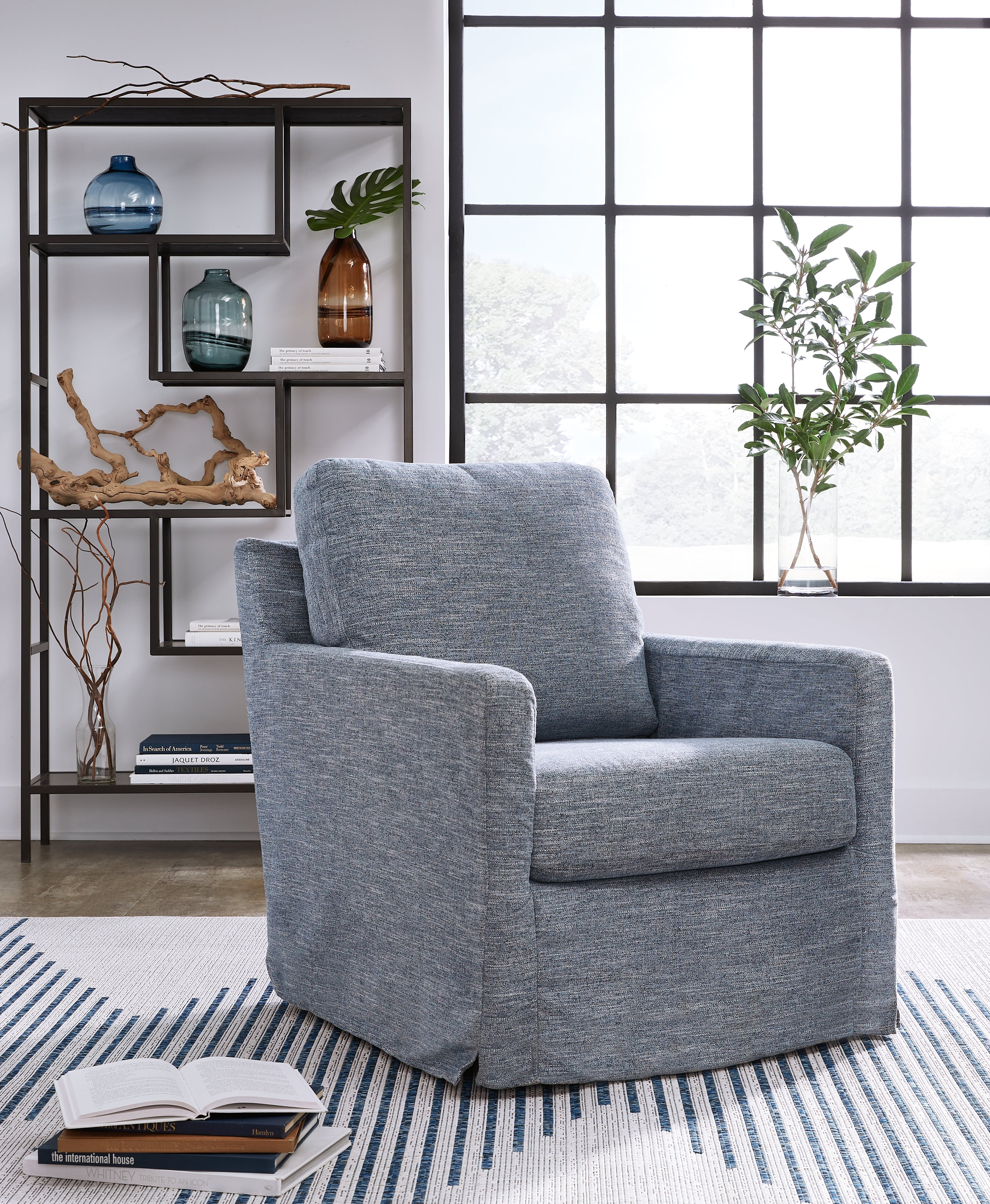 3 Brothers Decor - Ashley Furniture - Nenana Next-Gen Nuvella Swivel Glider Accent Chair - Swivel Glider Accent Chair / Denim - A3000646