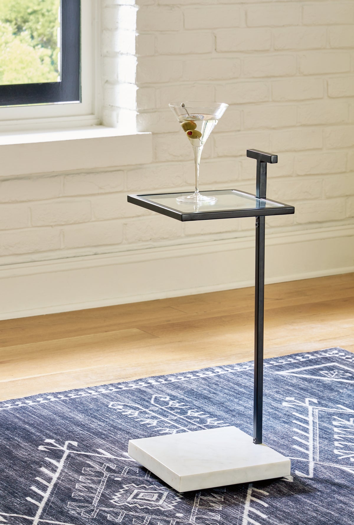 3 Brothers Decor - Ashley Furniture - Mannill Accent Table - Accent Table / Black/White - A4000630