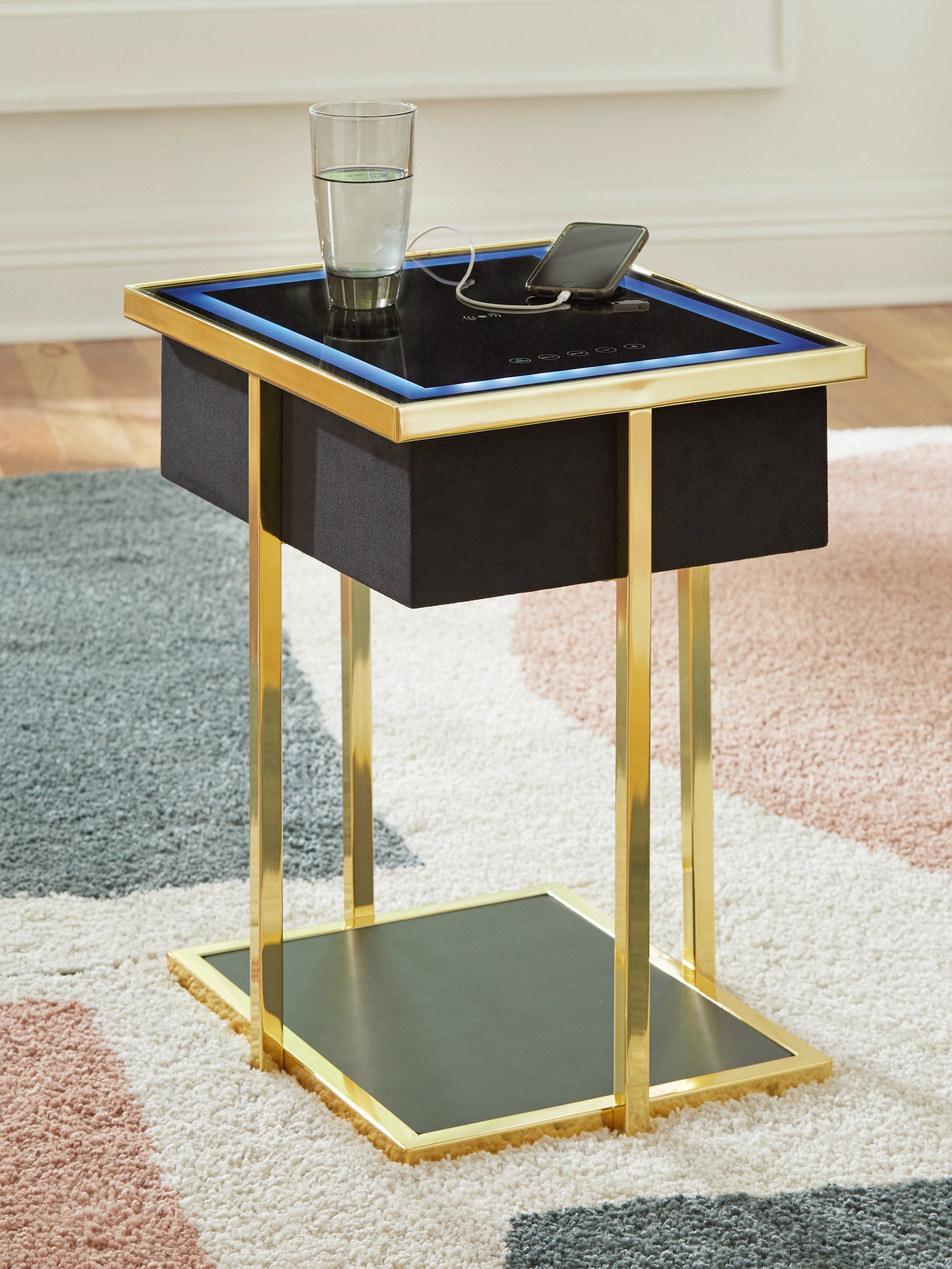 3 Brothers Decor - Ashley Furniture - Rexwell Accent Table with Speaker - Accent Table with Speaker / Black/Gold Finish - A4000681