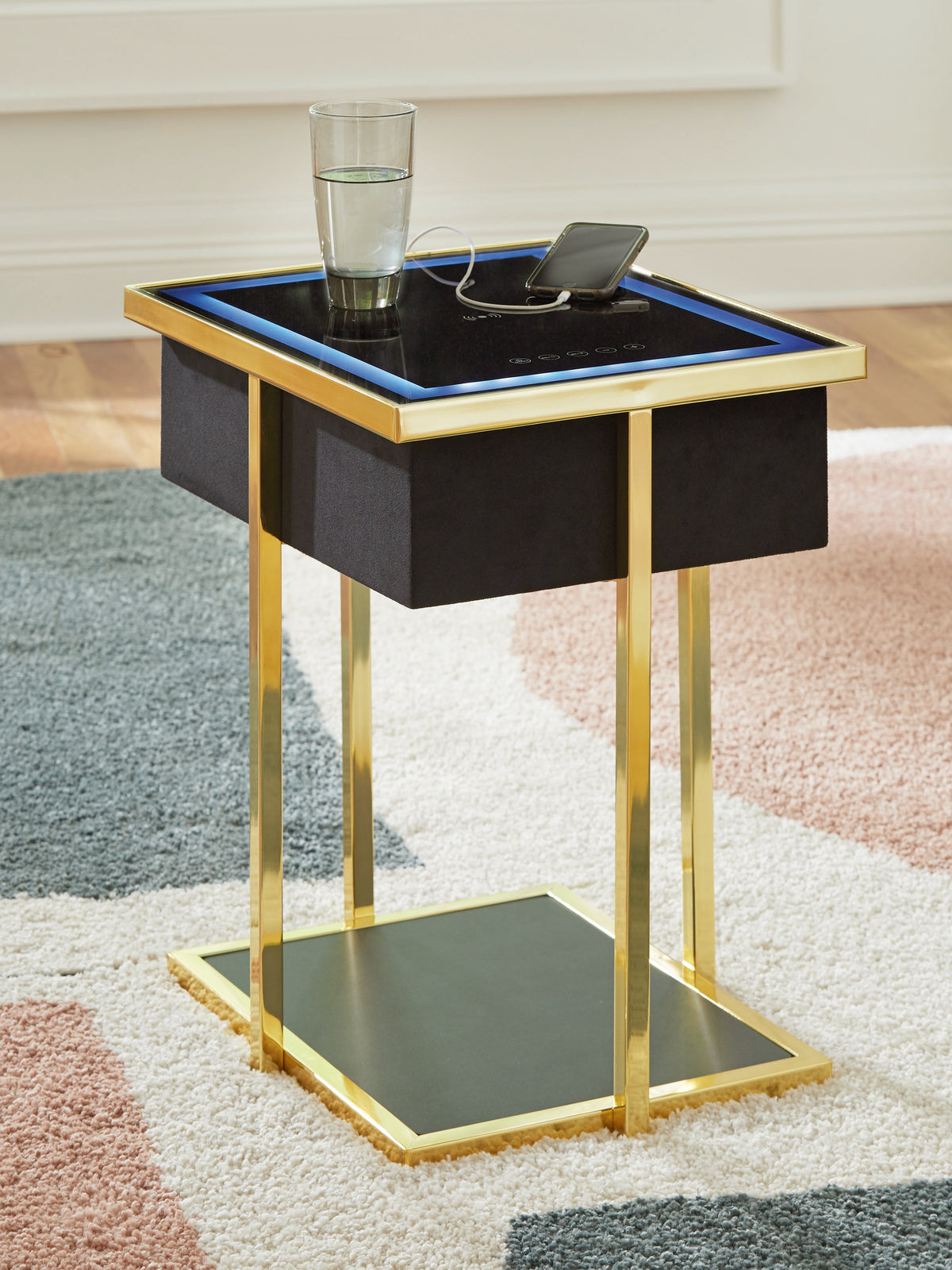 3 Brothers Decor - Ashley Furniture - Rexwell Accent Table with Speaker - Accent Table with Speaker / Black/Gold Finish - A4000681