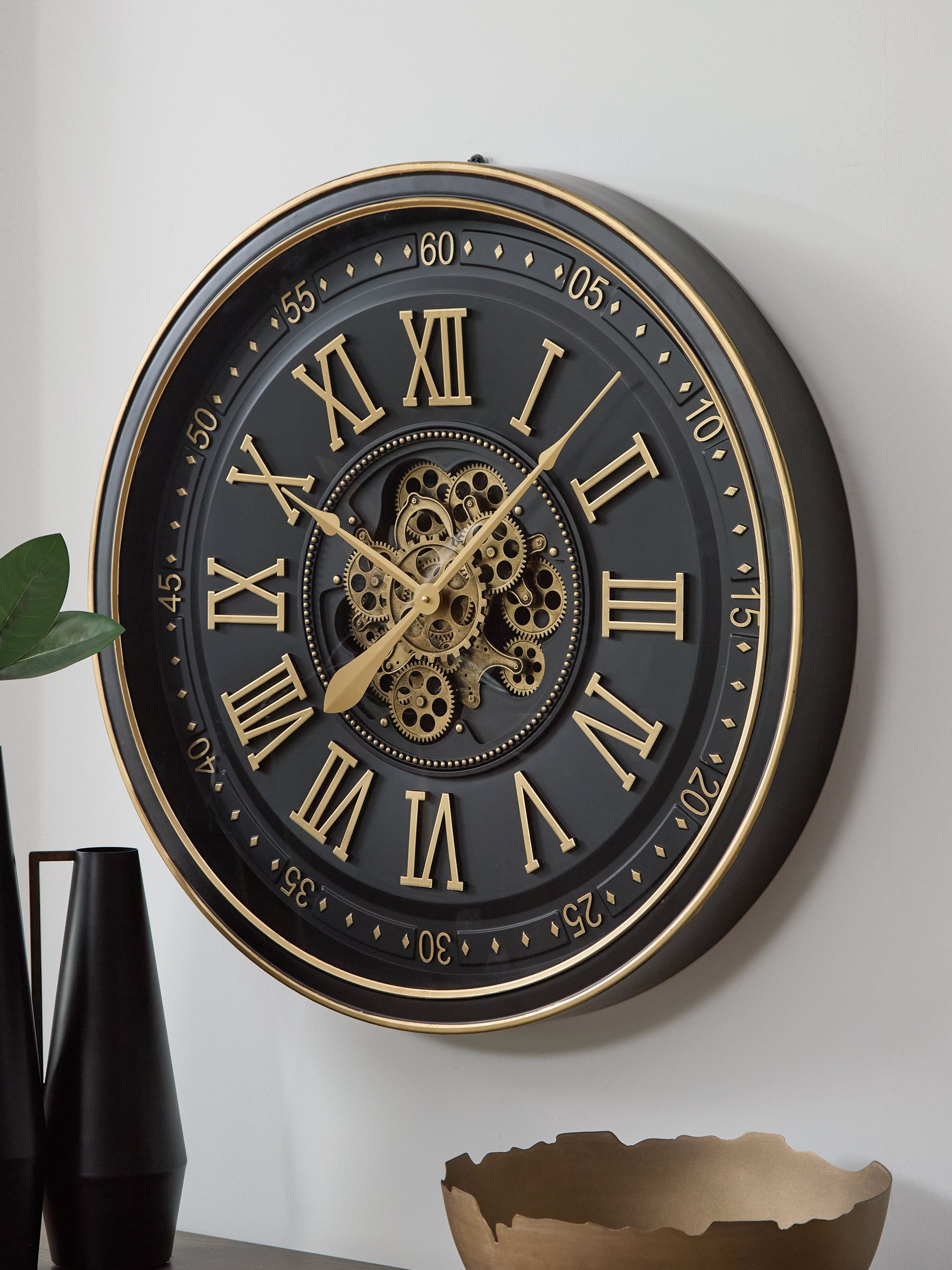 3 Brothers Decor - Ashley Furniture - Dairton Wall Decor - Wall Clock / Black/Gold Finish - A8010385