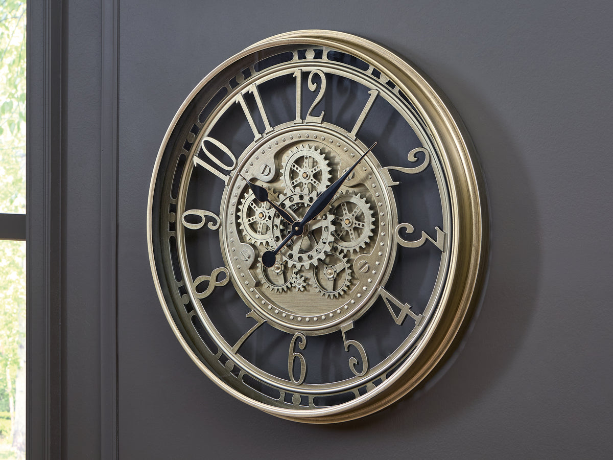 3 Brothers Decor - Ashley Furniture - Gilover Wall Decor - Wall Clock / Champagne Finish - A8010386