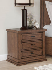 3 Brothers Decor - Ashley Furniture - Taffenbrook Bedroom - Three Drawer Night Stand / Medium Brown - B849-93