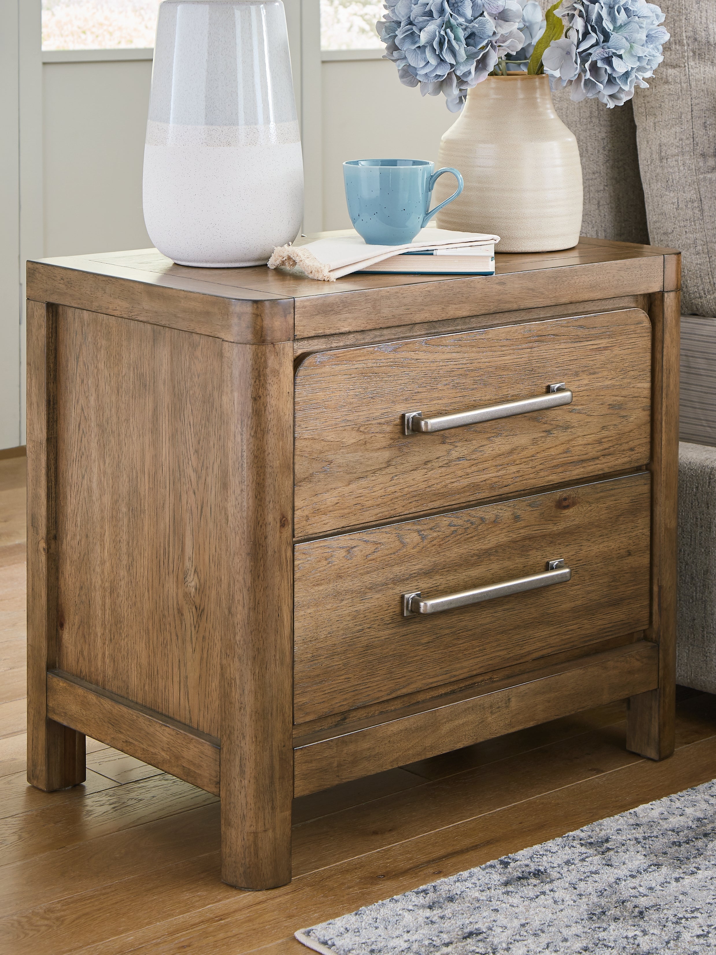3 Brothers Decor - Ashley Furniture - Cabalynn Bedroom - Two Drawer Night Stand / Light Brown - B974-92
