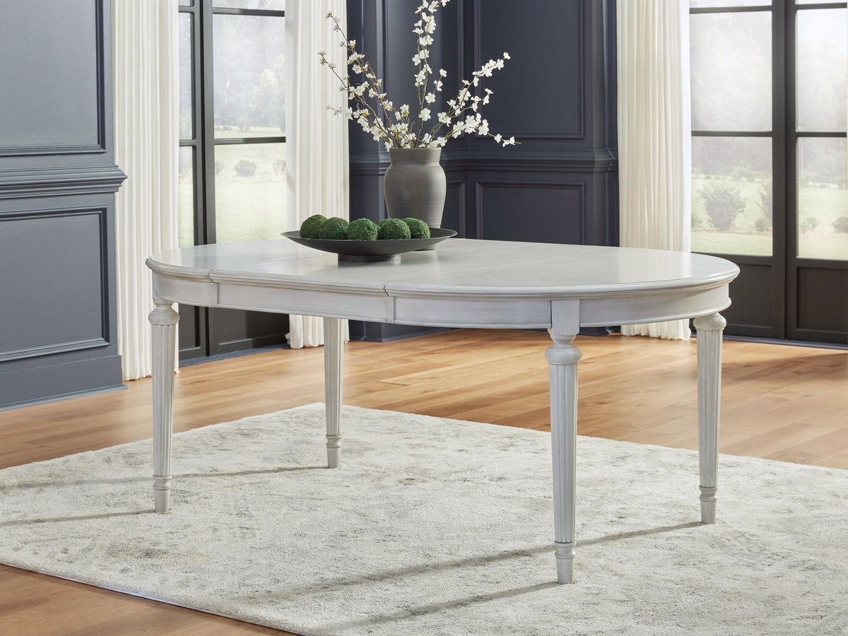 3 Brothers Decor - Ashley Furniture - Montelaine Dining Room - Oval Dining Room EXT Table - D795-35