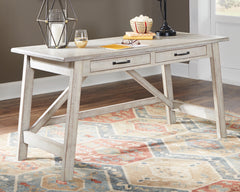 3 Brothers Decor - Ashley Furniture - Carynhurst Office Desk - Home Office Large Leg Desk / Whitewash - H755-44