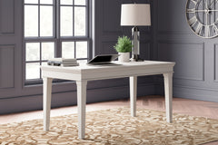 3 Brothers Decor - Ashley Furniture - Kanwyn Office Desk - Home Office Desk / Whitewash - H777-44