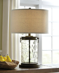 3 Brothers Decor - Ashley Furniture - Tailynn Lighting - Glass Table Lamp (1/CN) / Clear/Bronze Finish - L430324