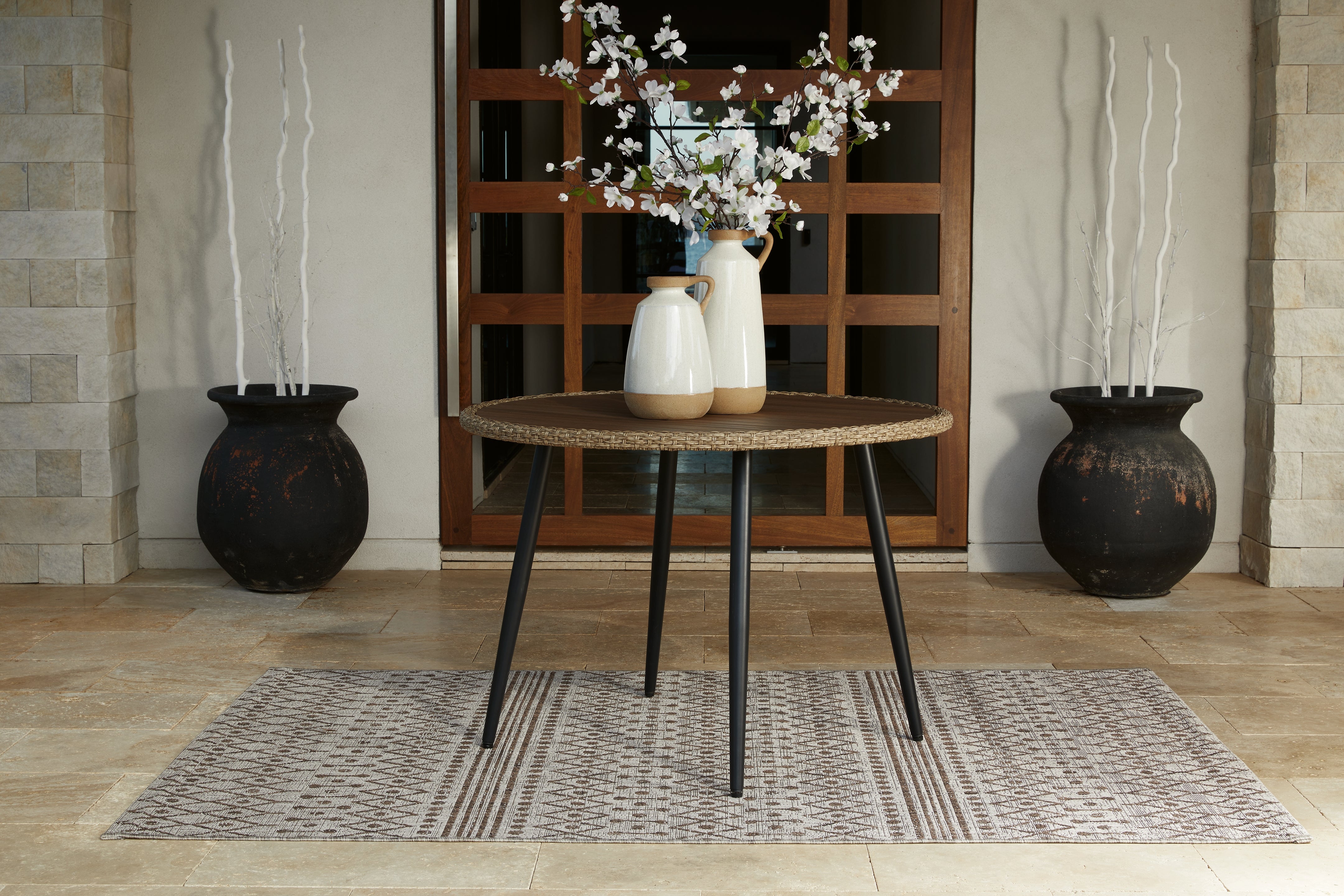 3 Brothers Decor - Ashley Furniture - Amaris Outdoor - Round Dining Table / Brown/Black - P369-615