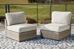 3 Brothers Decor - Ashley Furniture - Calworth Outdoor - Armless Chair w/Cushion (Set of 2) / Beige - P458-846