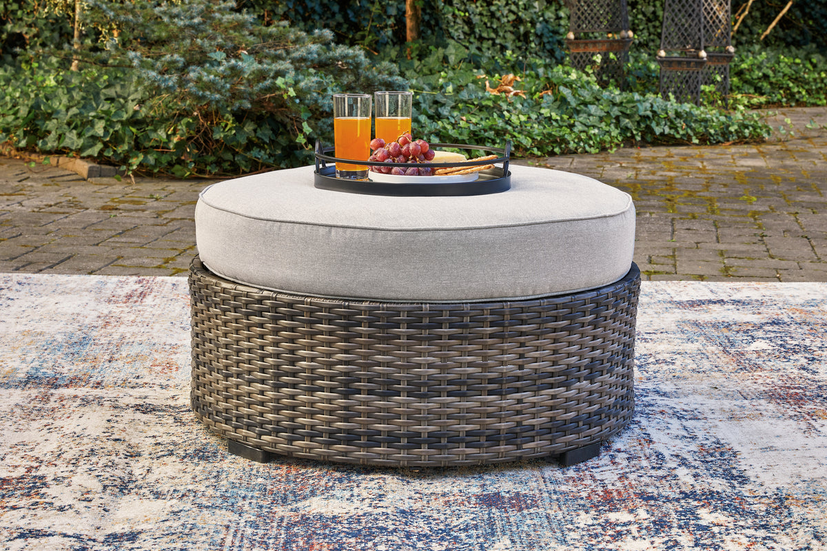 3 Brothers Decor - Ashley Furniture - Harbor Court Outdoor - Ottoman with Cushion / Gray - P459-814