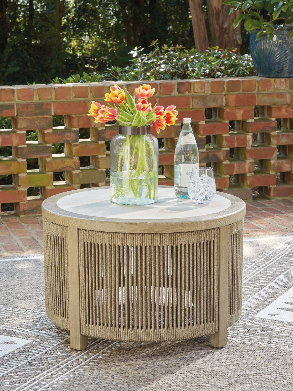 3 Brothers Decor - Ashley Furniture - Spooners Cove Outdoor - Round Cocktail Table - PCP469-708