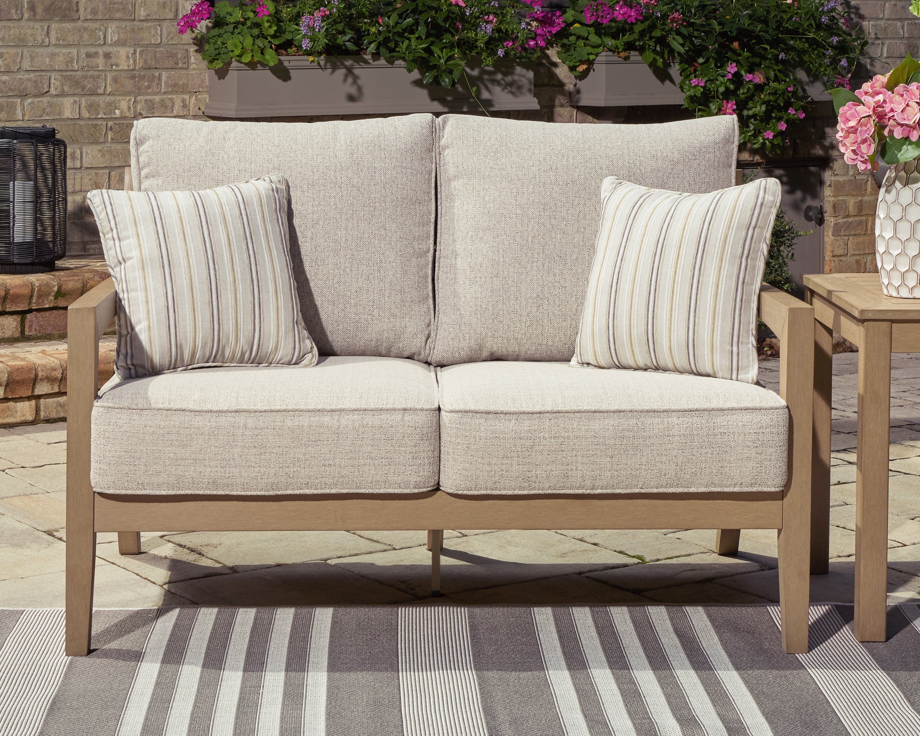 3 Brothers Decor - Ashley Furniture - Hallow Creek Outdoor - Loveseat w/Cushion / Driftwood - P560-835