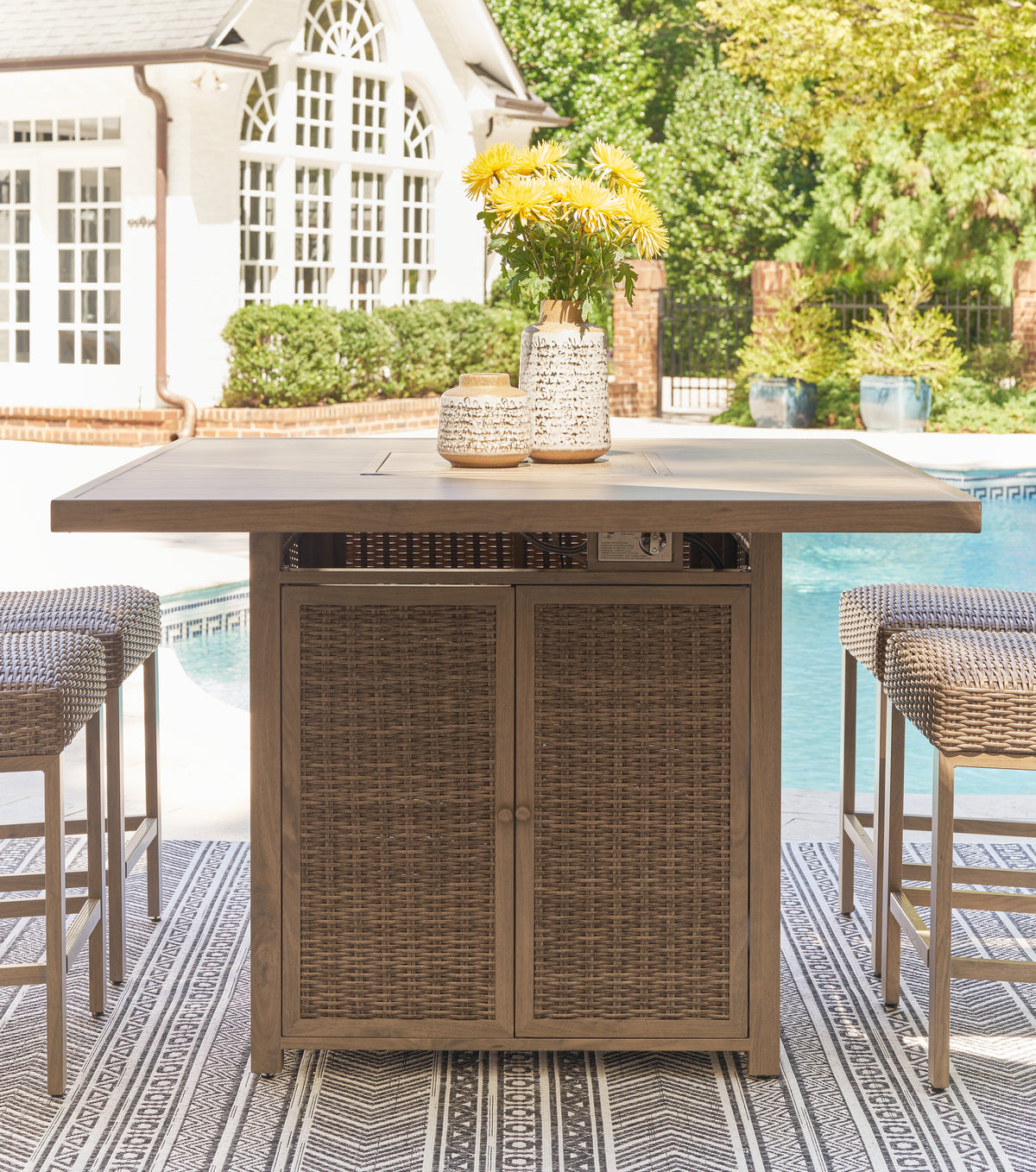 3 Brothers Decor - Ashley Furniture - Walton Bridge Outdoor - Square Bar Table w/Fire Pit - P749-665