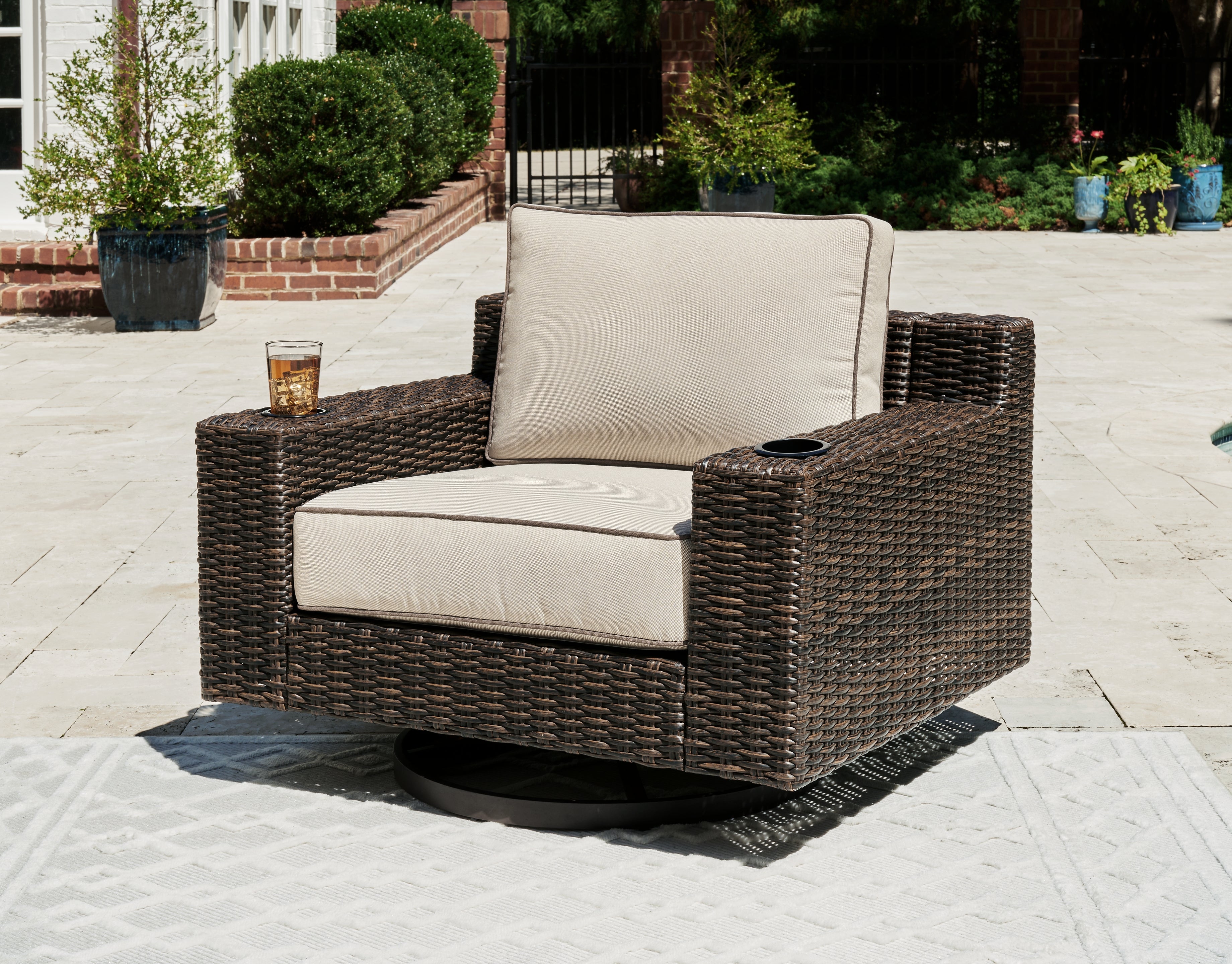 3 Brothers Decor - Ashley Furniture - Coastline Bay Outdoor - Swivel Lounge w/ Cushion / Brown - P784-821