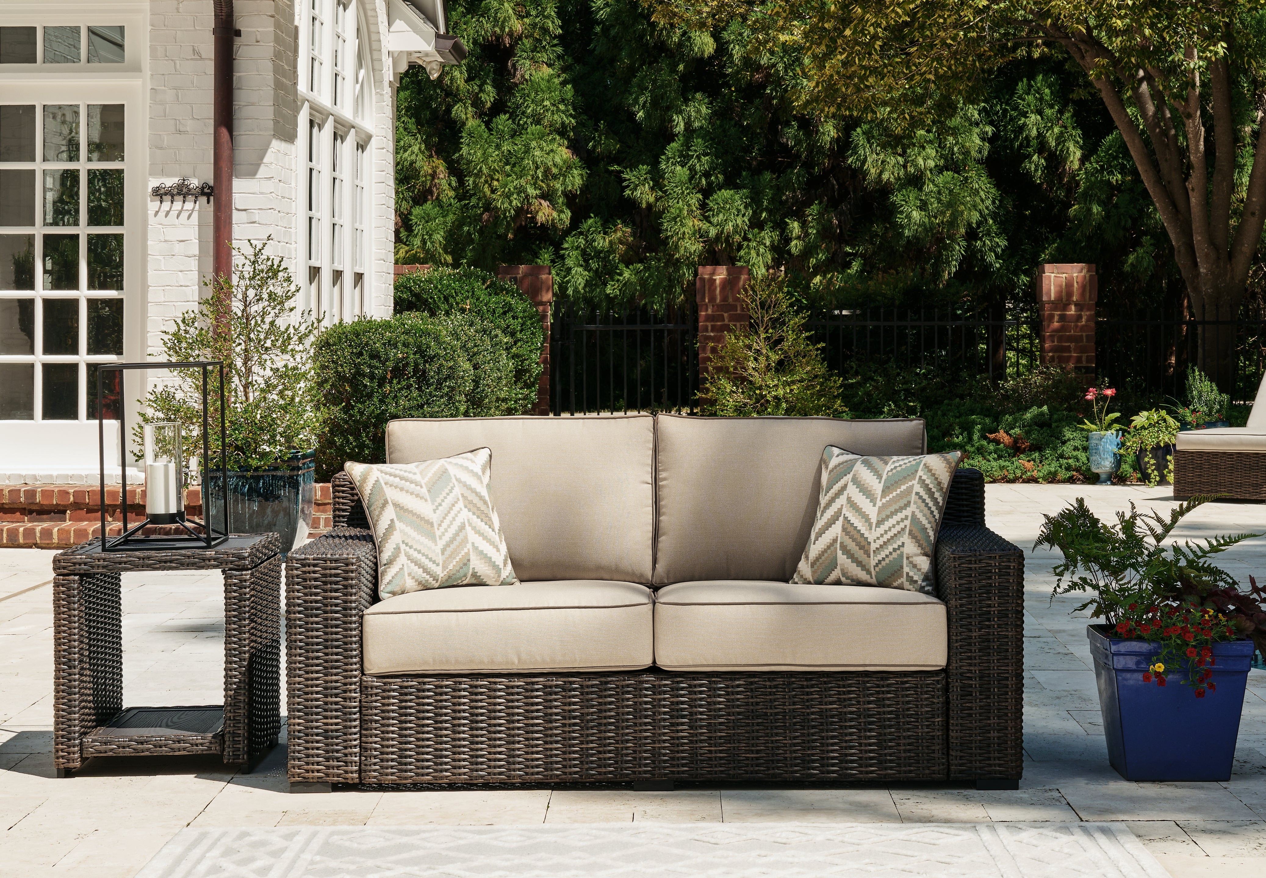 3 Brothers Decor - Ashley Furniture - Coastline Bay Outdoor - Loveseat w/Cushion / Brown - P784-835