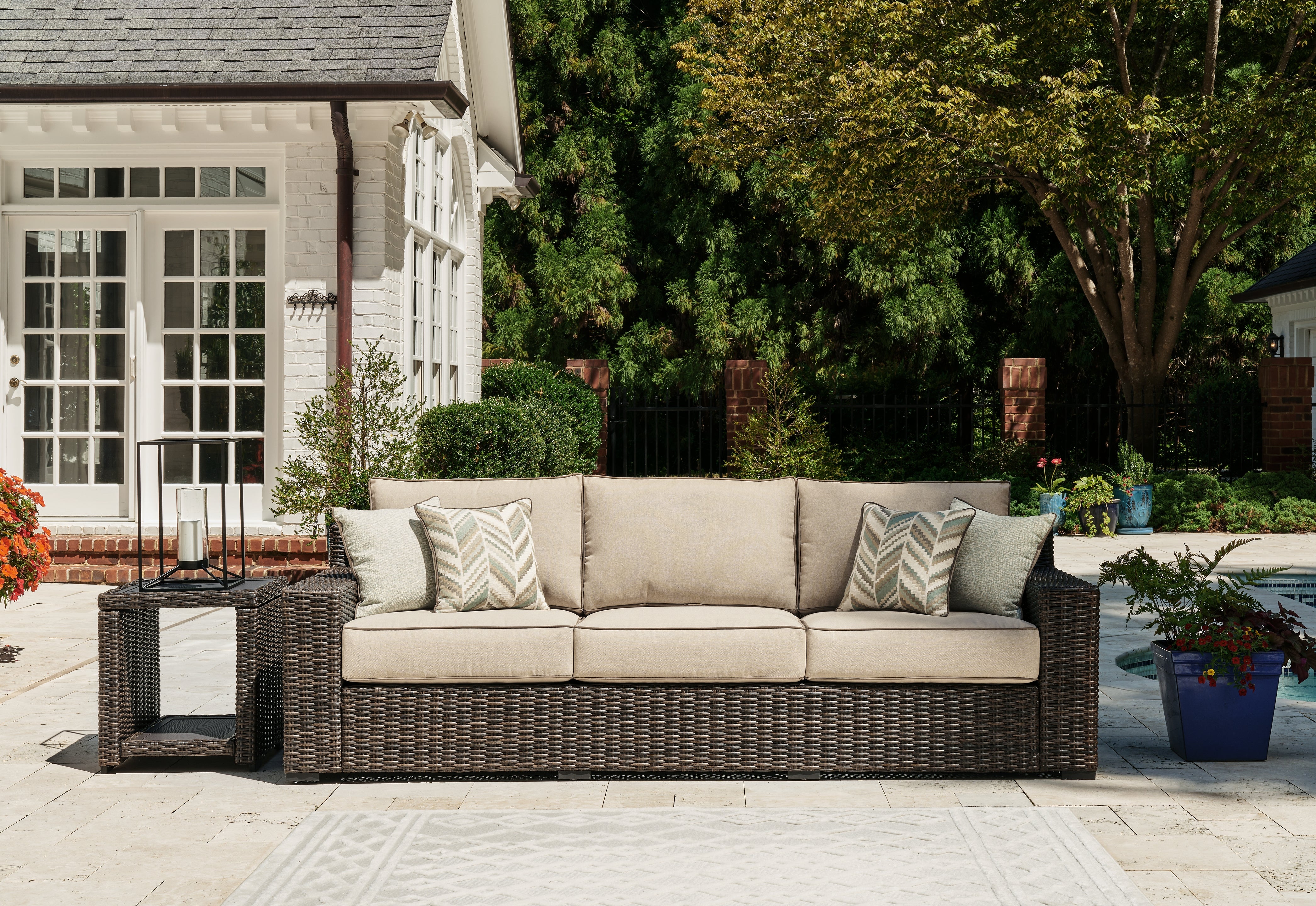 3 Brothers Decor - Ashley Furniture - Coastline Bay Outdoor - Sofa with Cushion / Brown - P784-838