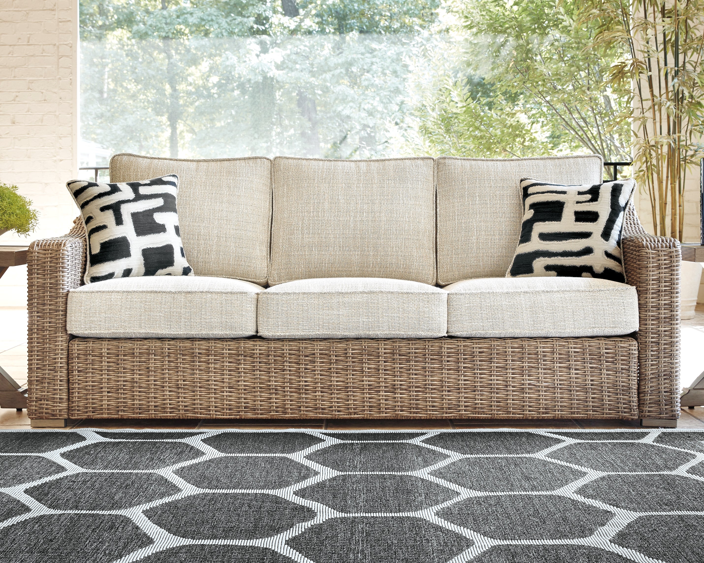 3 Brothers Decor - Ashley Furniture - Beachcroft Outdoor - Sofa with Cushion / Beige - P791-838