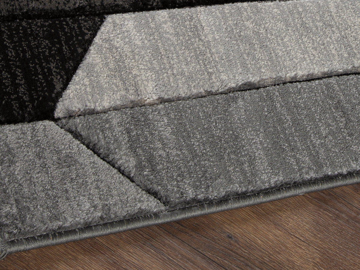 3 Brothers Decor - Ashley Furniture - Chayse Rug - 5' x 6'7" Rug / Black/Gray - R403462