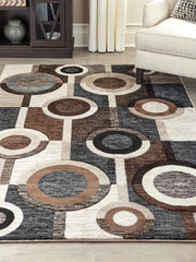 3 Brothers Decor - Ashley Furniture - Guintte Rug - 8'2" x 9'6" Rug / Multi - R403971