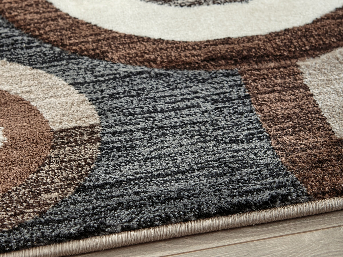 3 Brothers Decor - Ashley Furniture - Guintte Rug - 5' x 6'7" Rug / Multi - R403972