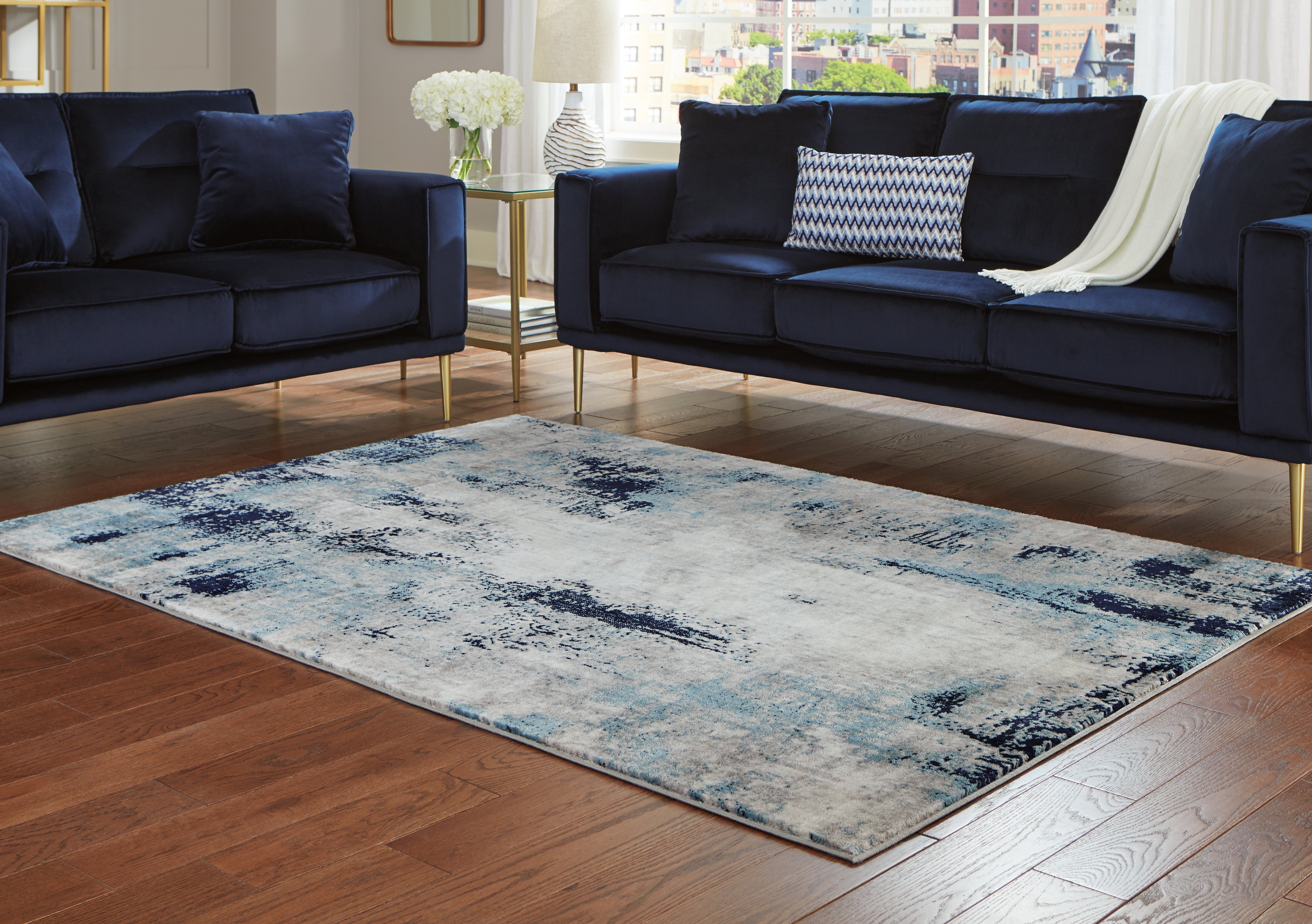 3 Brothers Decor - Ashley Furniture - Leonelle Rug - 5'3" x 7'3" Rug / Cream/Blue/Gray - R404872
