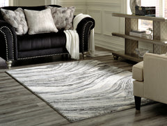 3 Brothers Decor - Ashley Furniture - Wysdale Rug - 7'10" x 10'3" Rug / Ivory/Gray - R404901