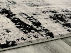 3 Brothers Decor - Ashley Furniture - Zekeman Rug - 5'3" x 7'7" Rug / Black/Cream/Gray - R404922