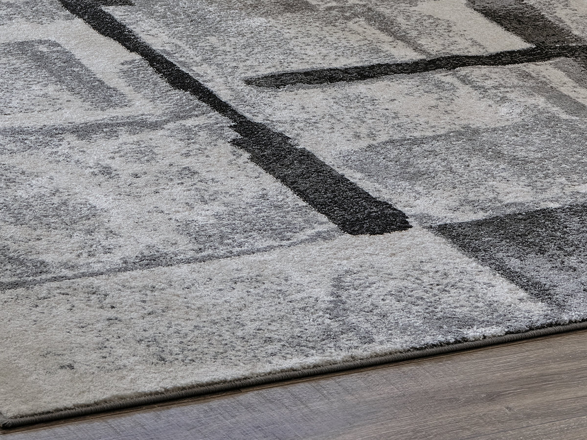 3 Brothers Decor - Ashley Furniture - Brycebourne Rug - 5'3" x 7'7" Rug / Black/Cream/Gray - R404982