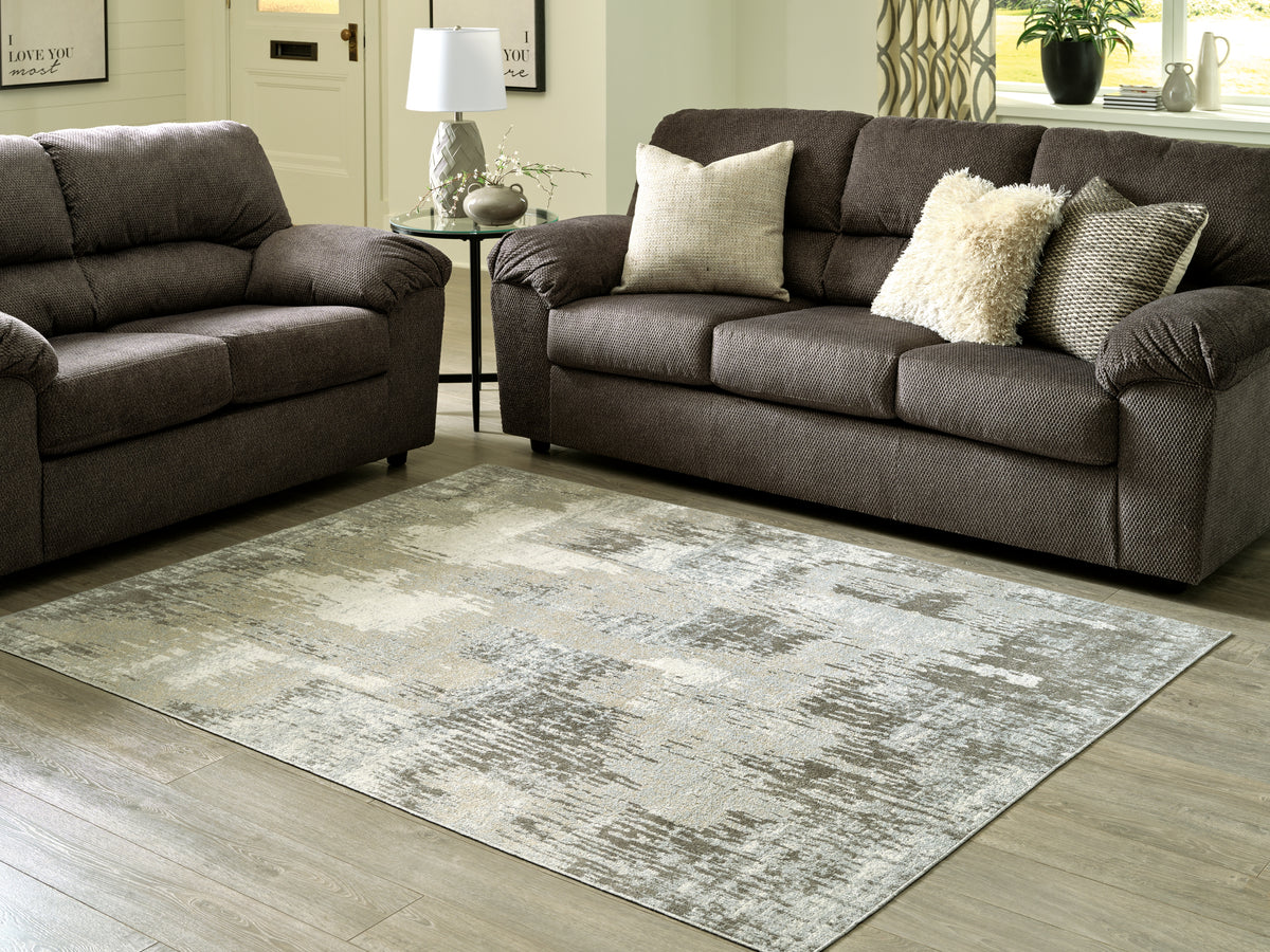 3 Brothers Decor - Ashley Furniture - Arriston Rug - 7'10" x 10' Washable Rug / Multi - R405561