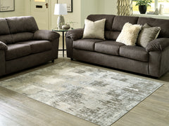 3 Brothers Decor - Ashley Furniture - Arriston Rug - 7'10" x 10' Washable Rug / Multi - R405561
